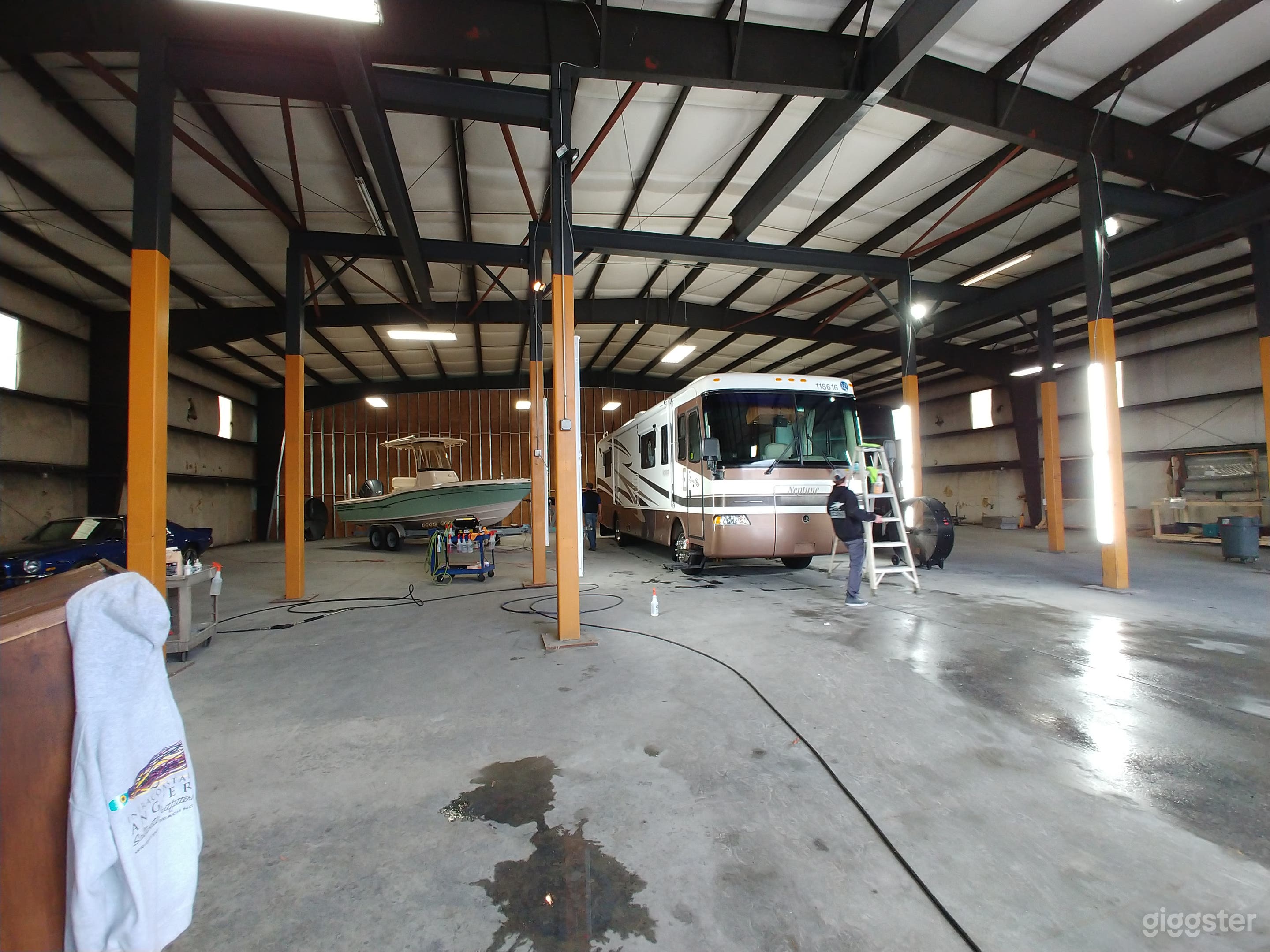Warehouse with high ceilings to accommodate Marine, RV, &amp; Aircraft Detailing.