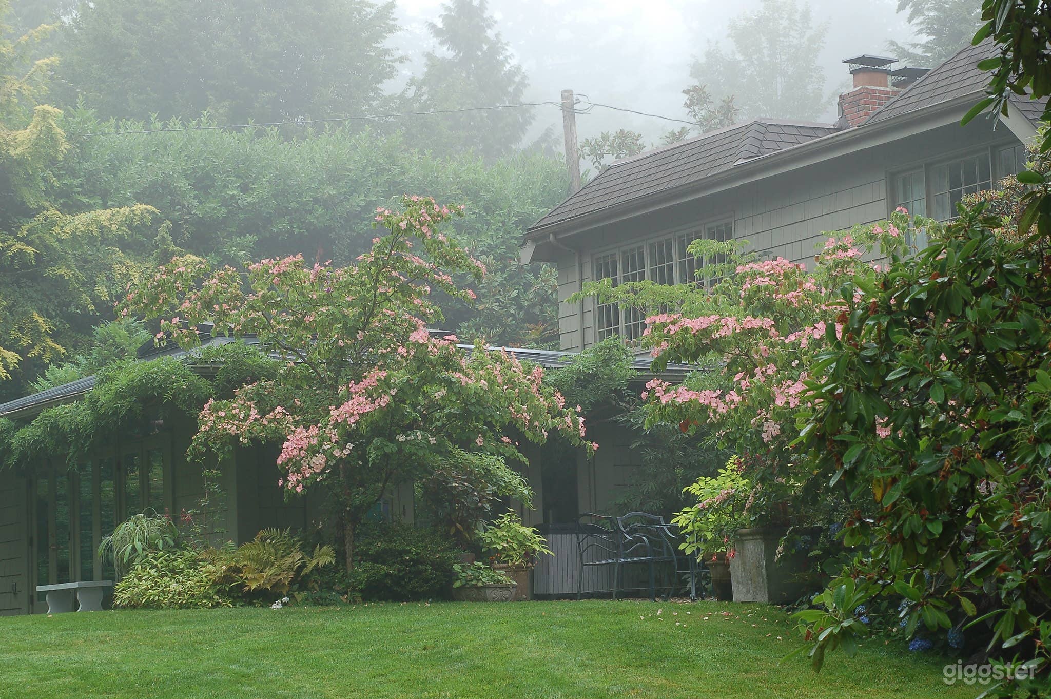 Ed's Cottage, an event space with wonderful natural light in the sunroom and a cozy fireplace in the dining room.