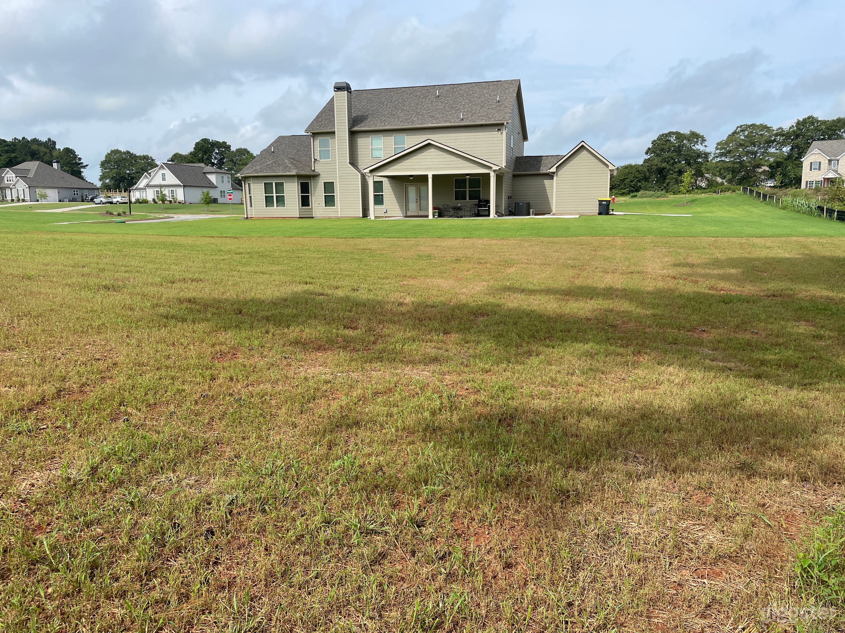 Back porch with a big back yard 