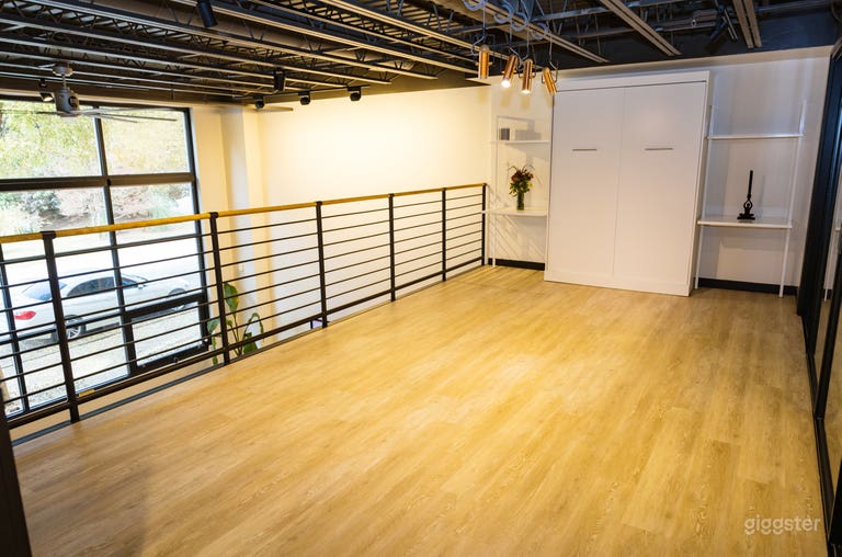  Open Loft shown clear with moveable furniture stored in back bedroom/office 