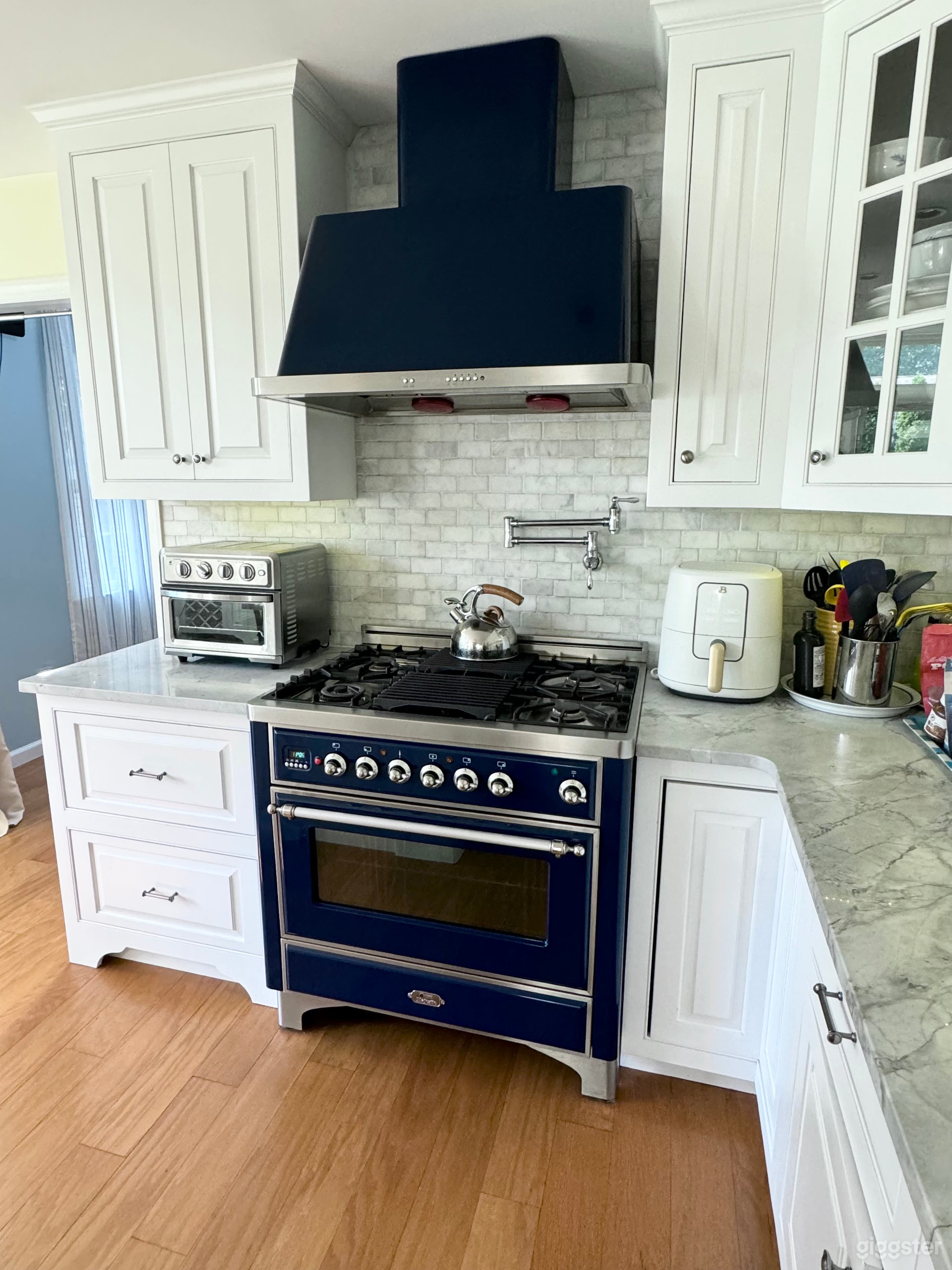 Classic Suburban Home with Beautiful White Kitchen Photo 3