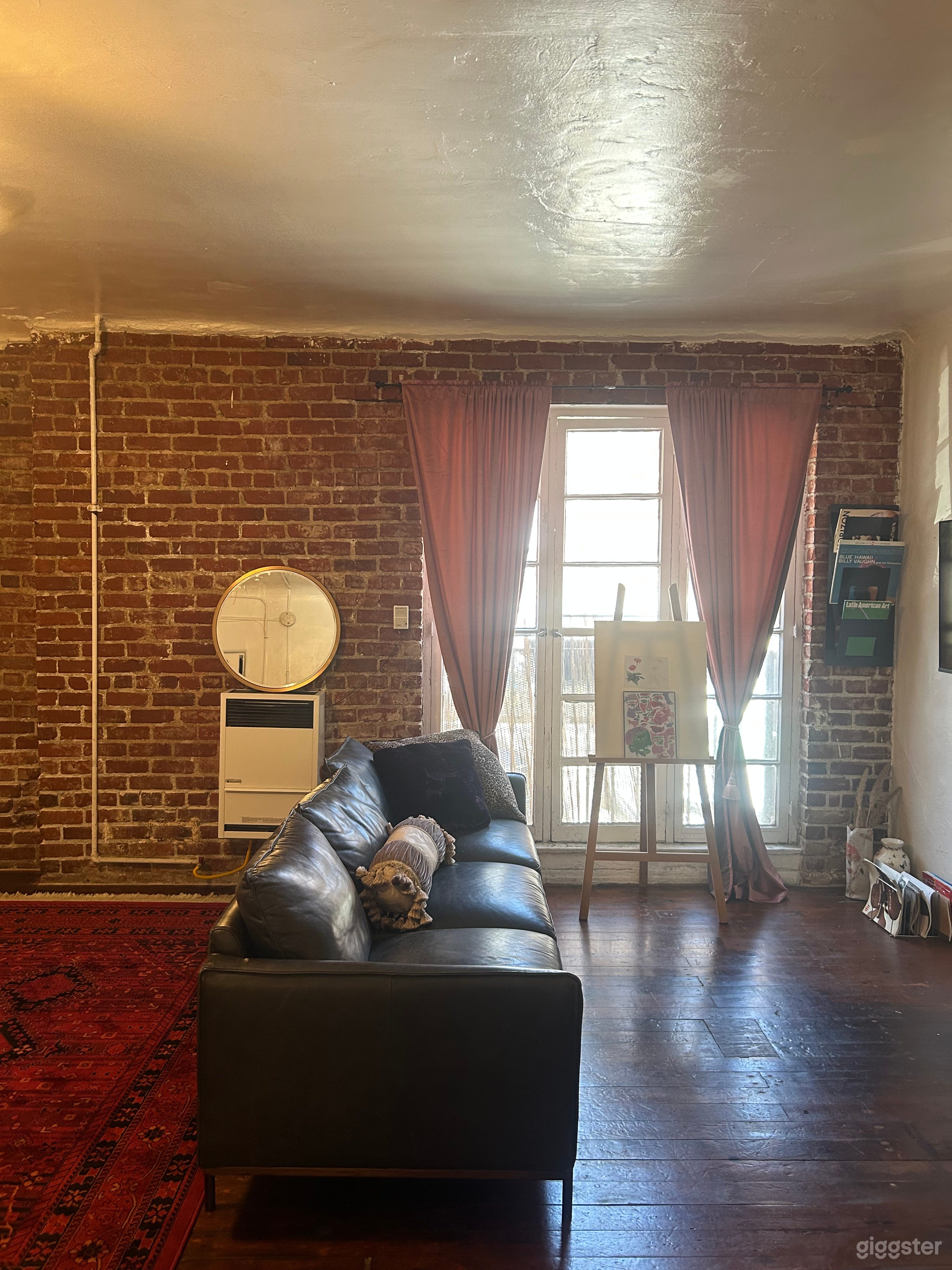 Airy Industrial Studio Apartment Photo 3