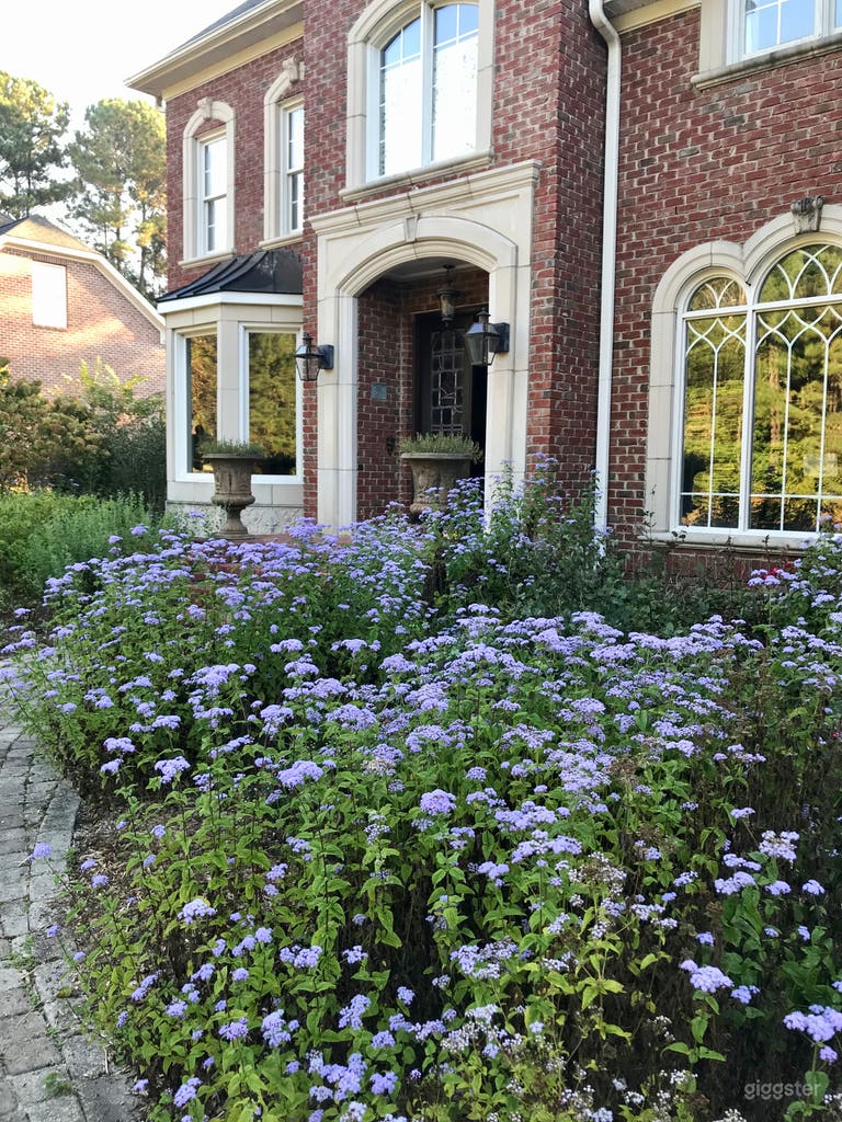  1 acres of gardens surrounding the home. 