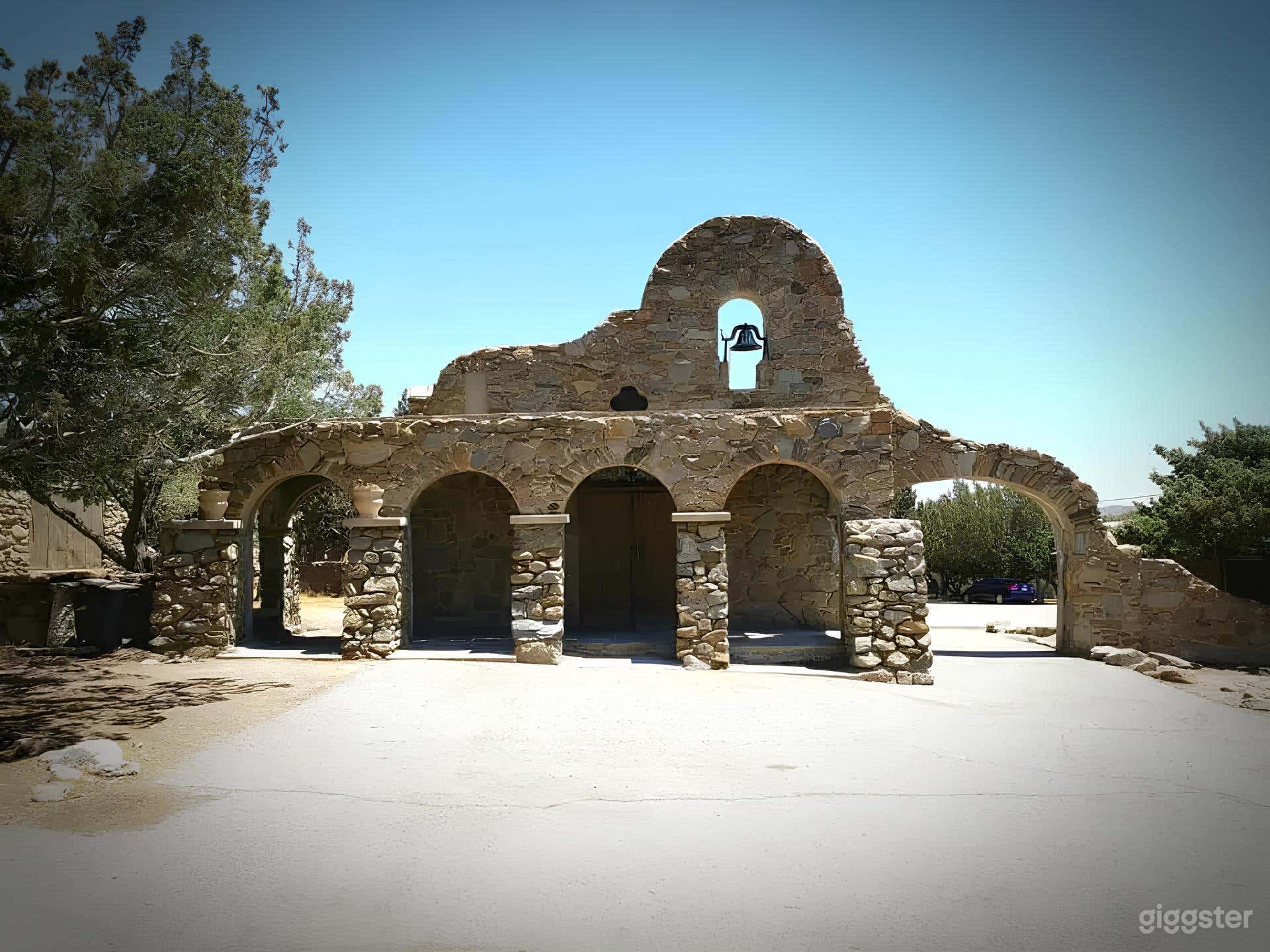 Mission style rock church in rural Acton on 40 ac Photo 1