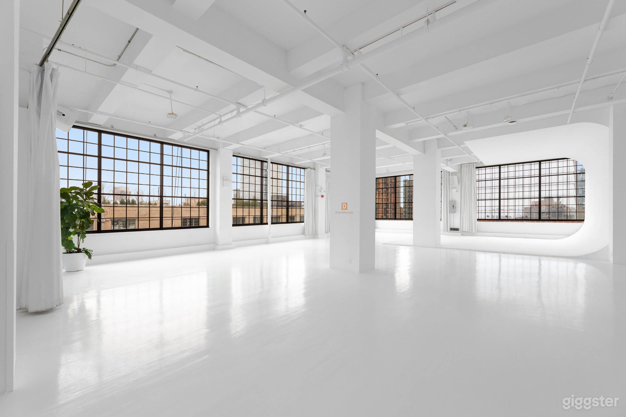 Minimal High-Ceiling Loft Photography Studio Photo 2
