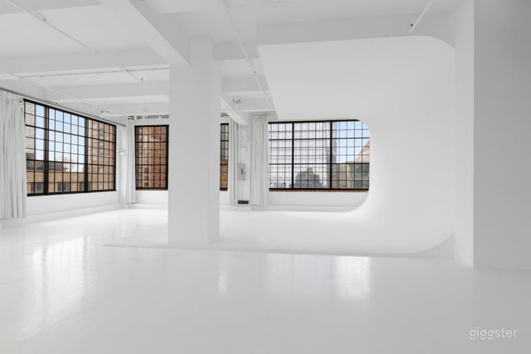  Wide-open loft studio configured for photography, filming, and intimate events. 