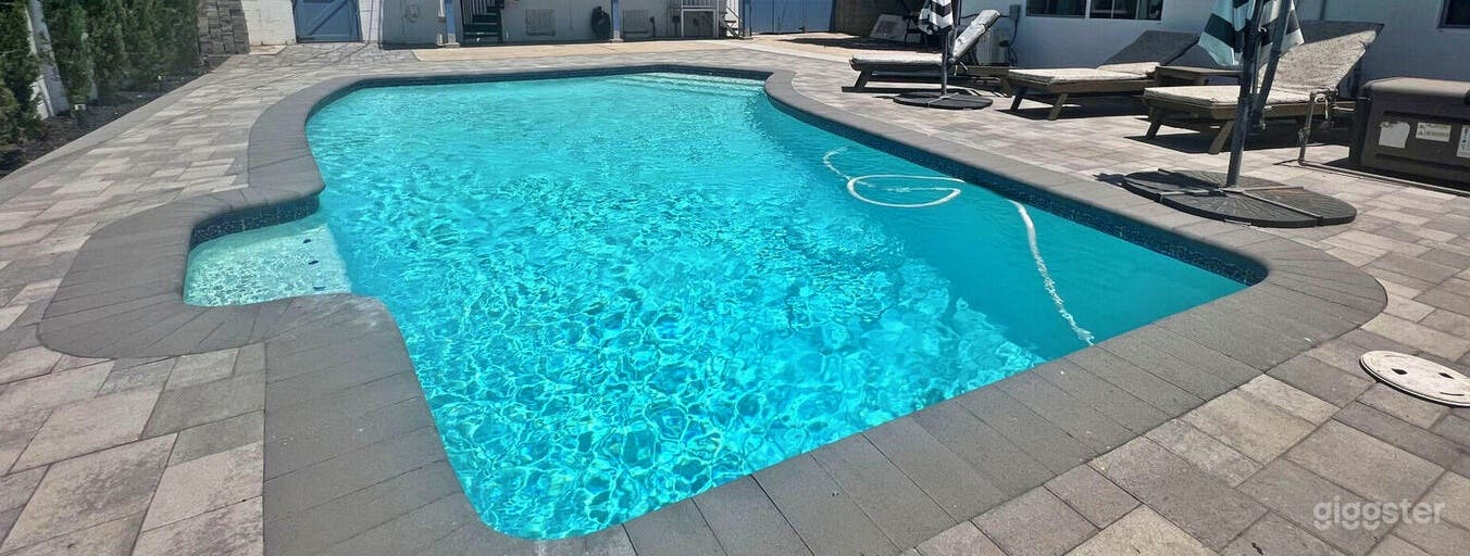 Reflective Swimming Pool Photo 4