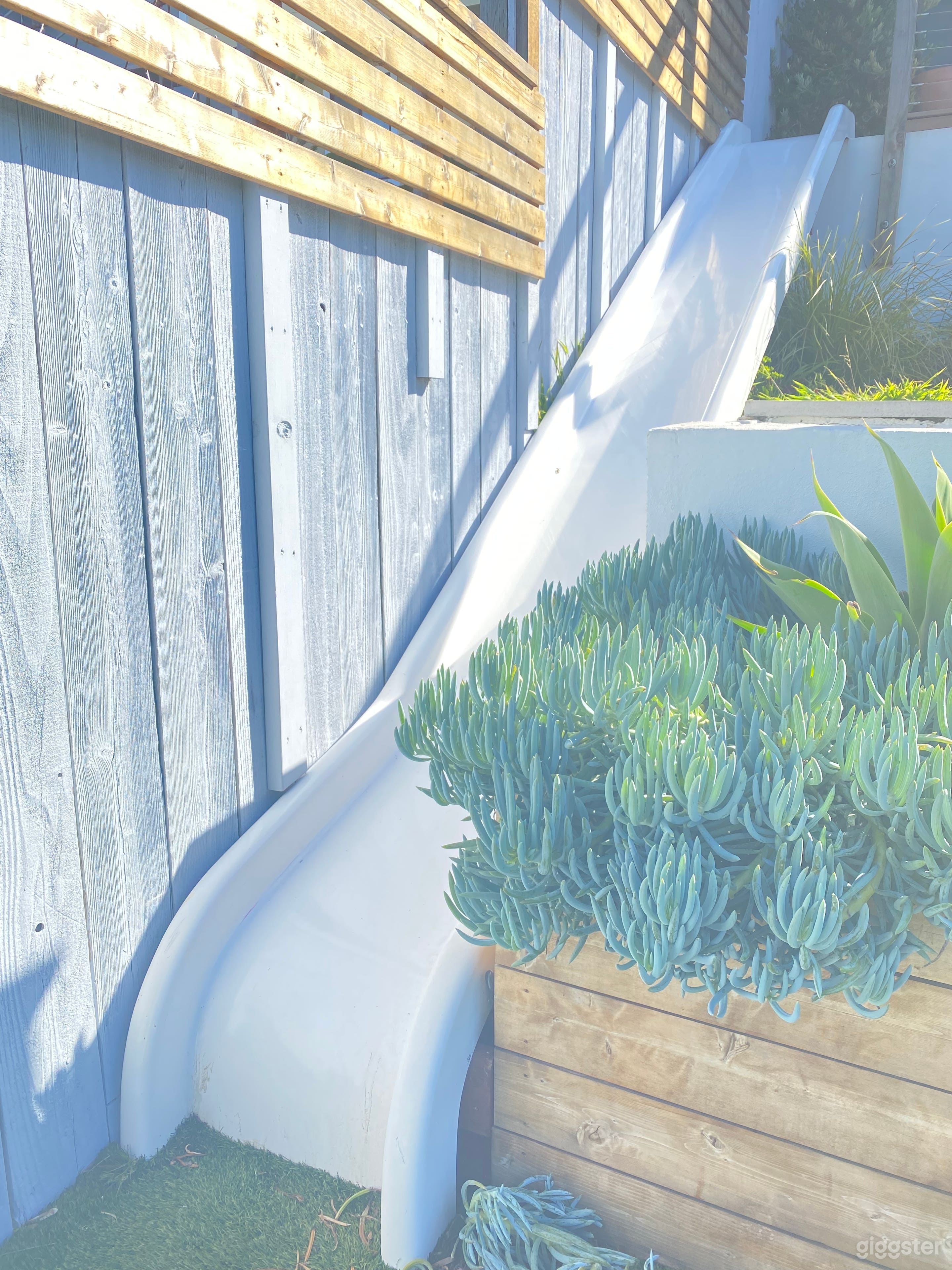 20 foot slide from top of deck to grass