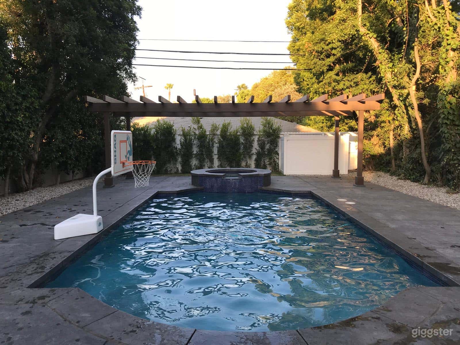 Spacious backyard and pool with jacuzzi. Photo 4