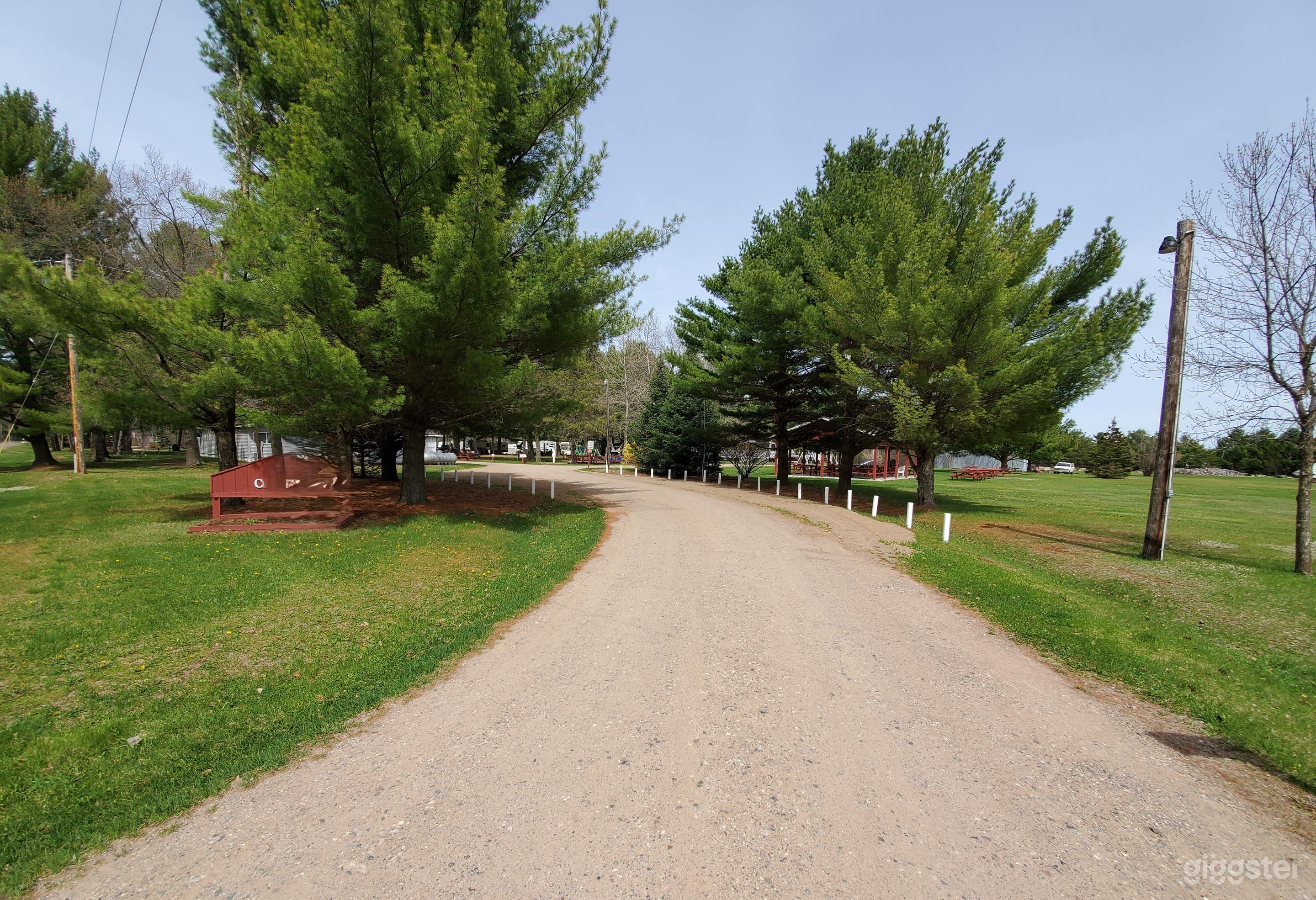 Lightly Wooded Outdoor RV Campground  Photo 1