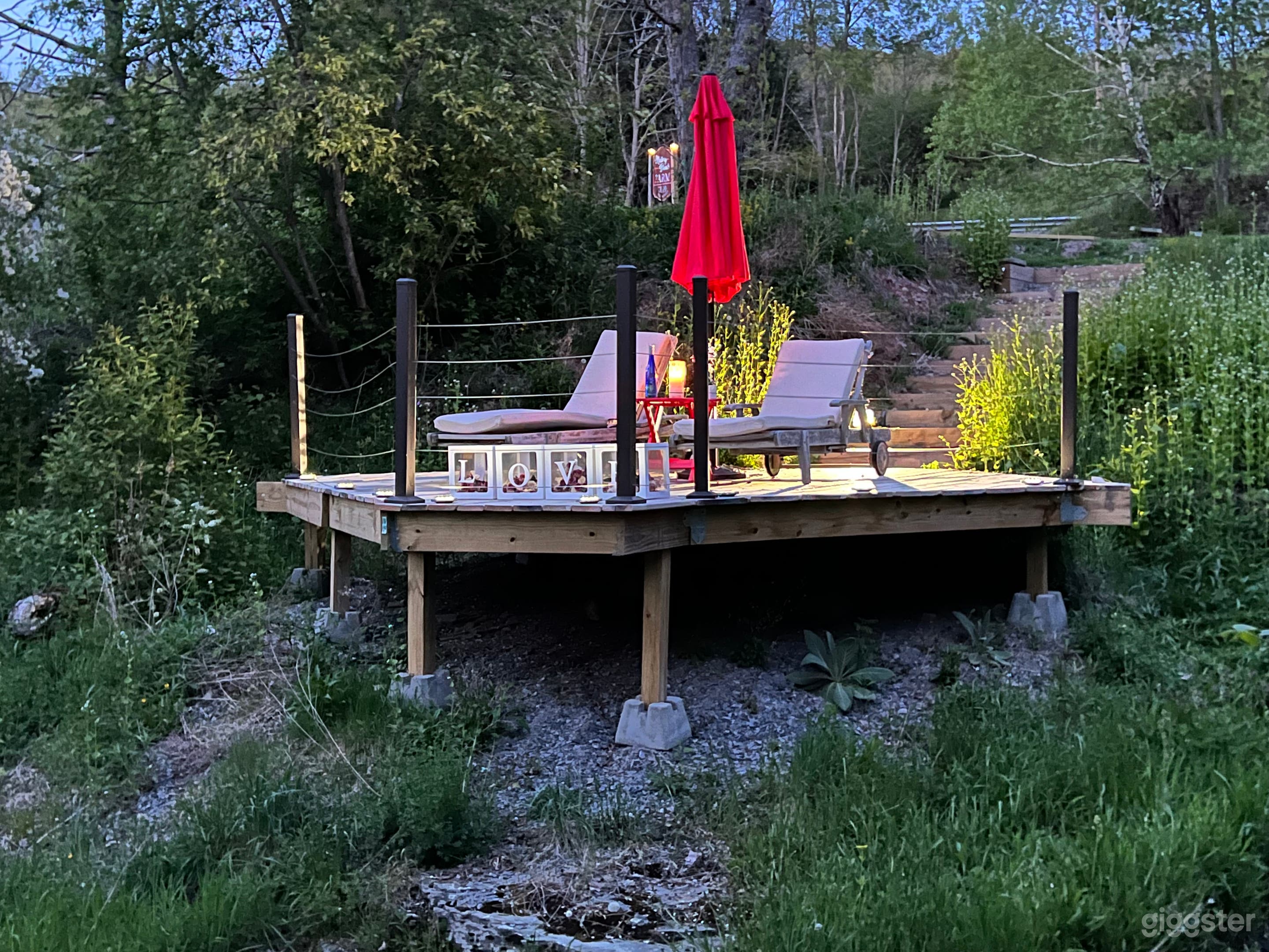 One of 10 decks throughout the property. This one sits above a 30 foot waterfall. Private small group 'break away' space for participants in your retreat group
