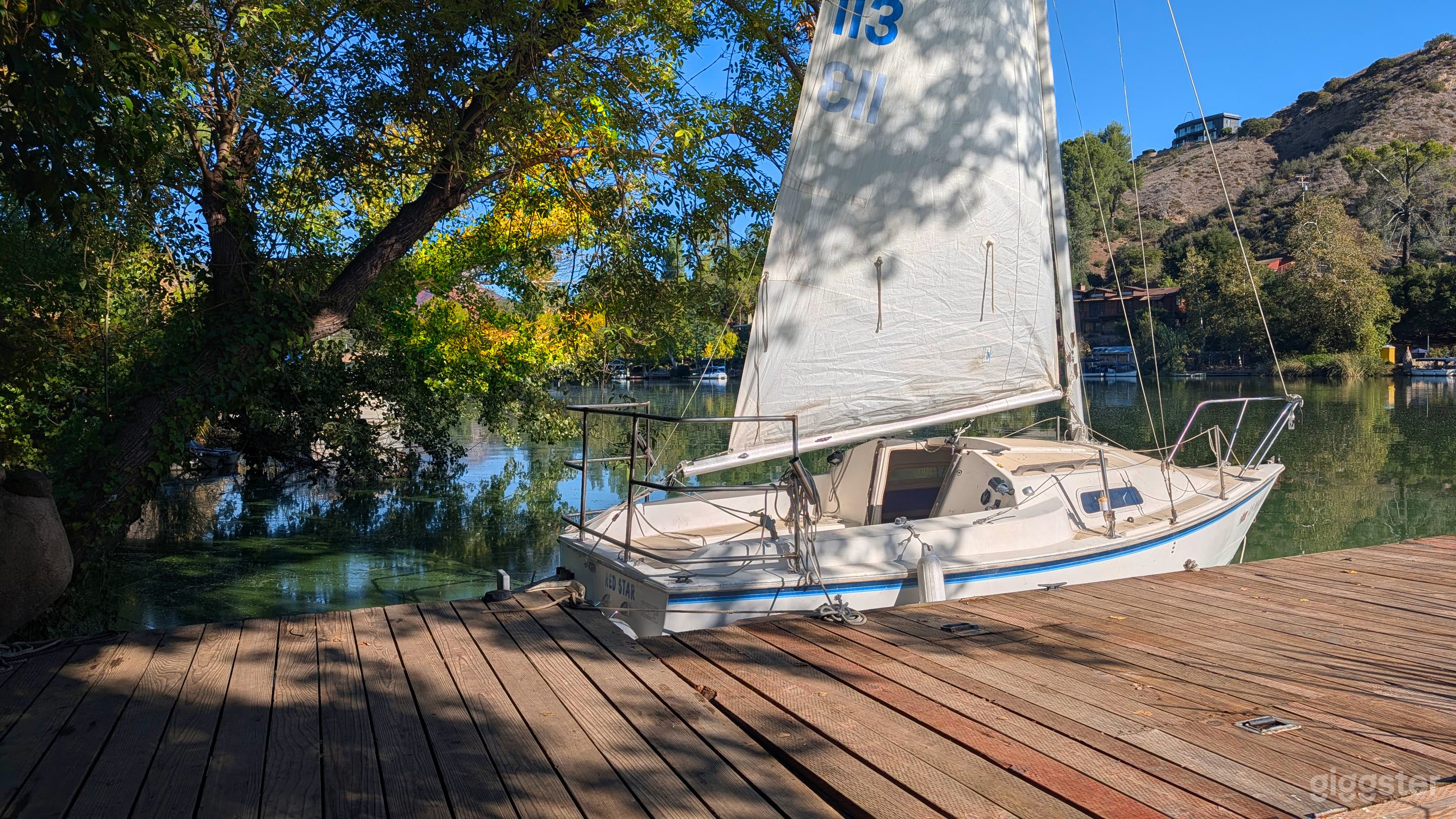 Our 18 foot sailboat is a classic beauty! Perfect for shots on the deck or in the cabin