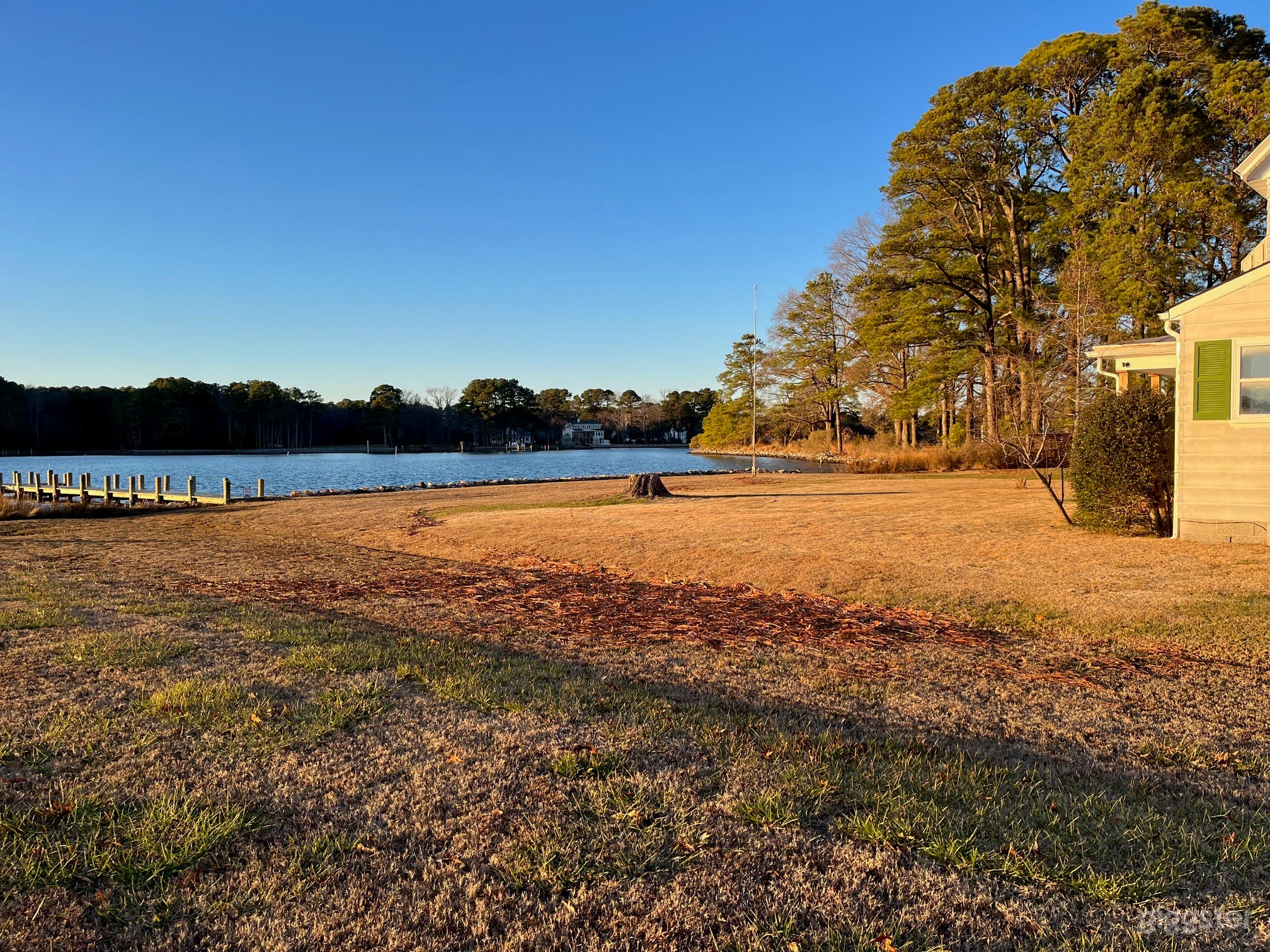 Waterfront Backyard with Open Lawn Photo 2