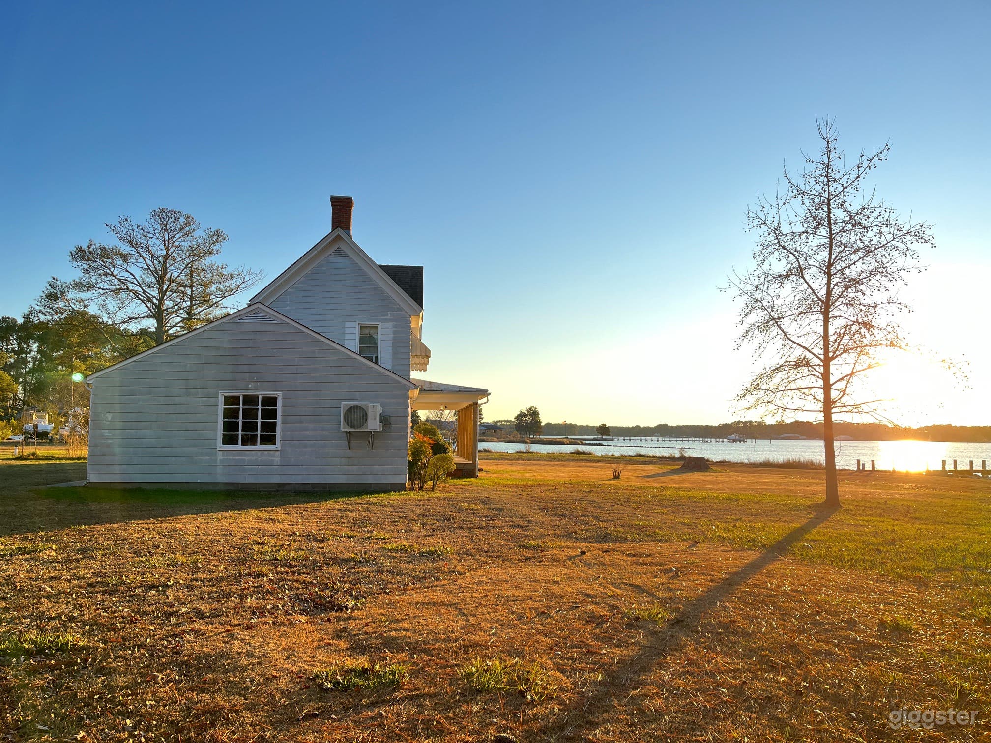Waterfront Backyard with Open Lawn Photo 1