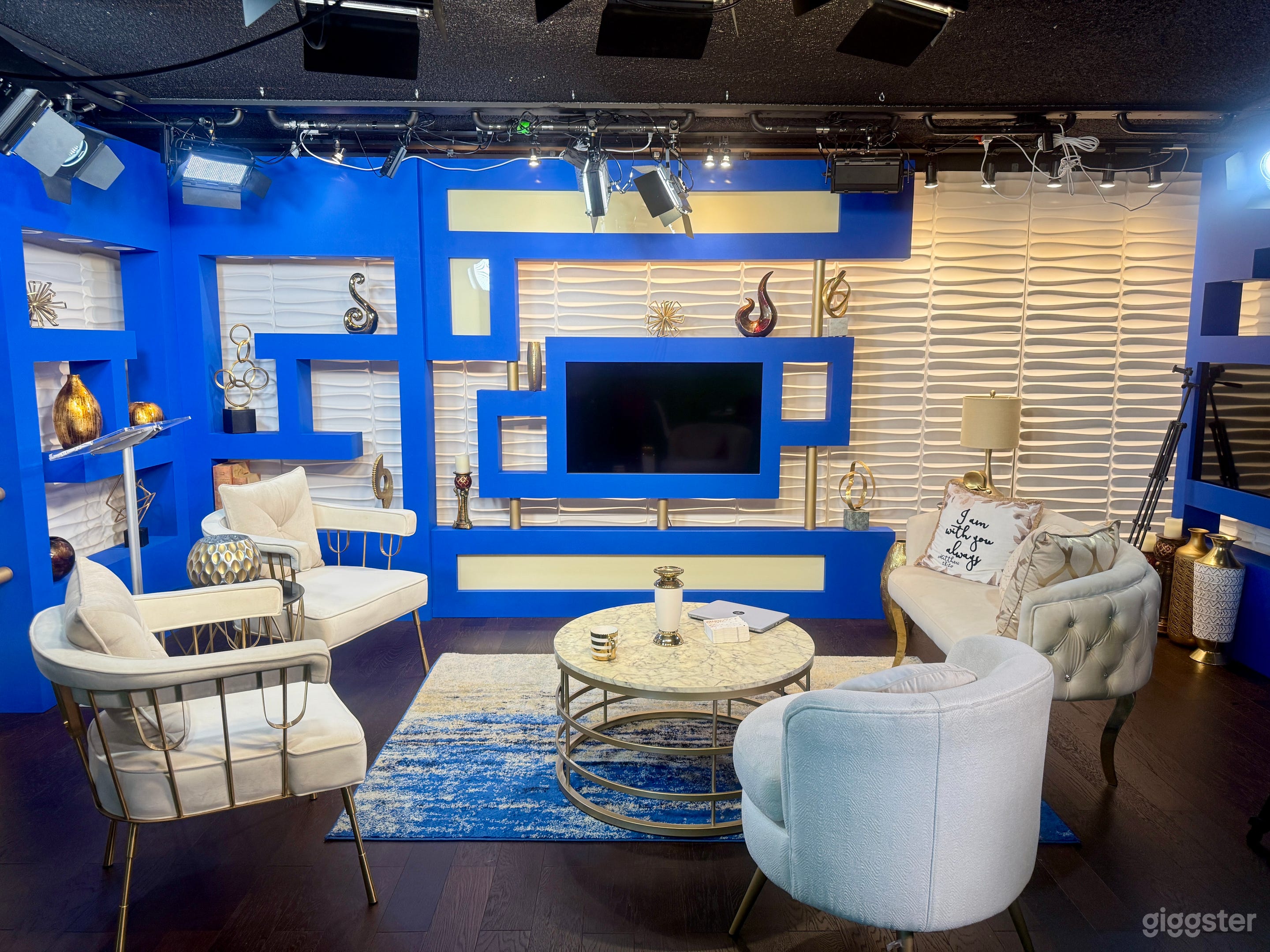 Interview / Talk Show Studio
Turnkey interview and talk show set with seating for hosts and guests, on-set display monitor, and studio lighting for polished productions.