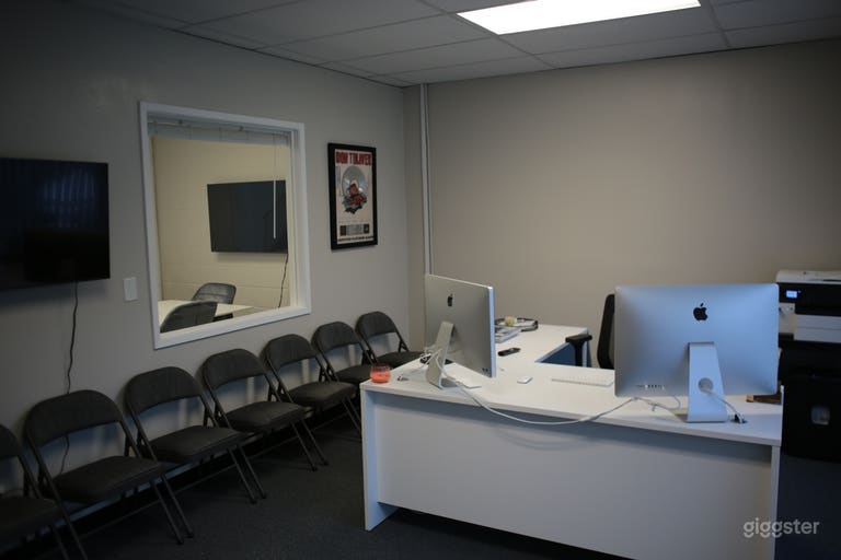  Reception area has airplay enabled 43&quot; Smart TV with HDMI connections, as well as a love seat and holding area.  