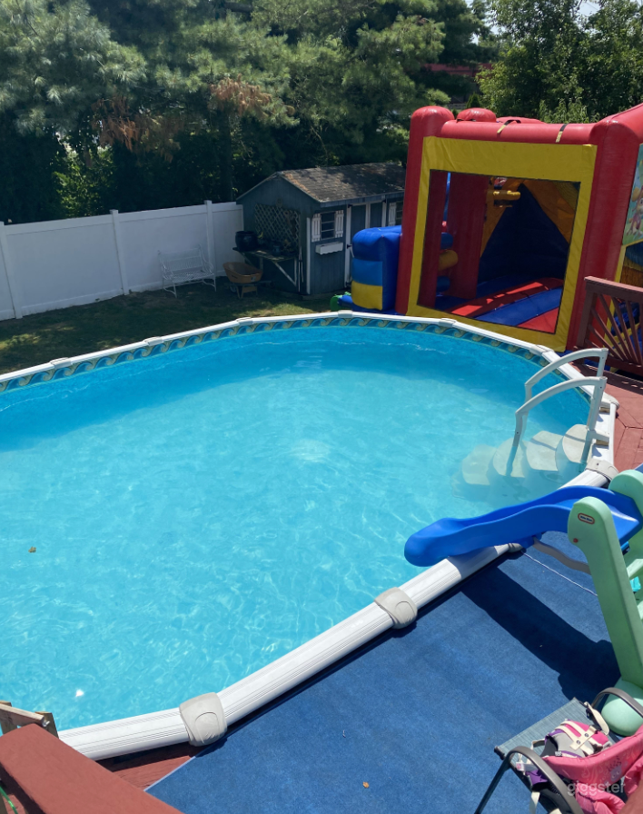 Large Swimming Pool with Historic Victorian Vibe Photo 2