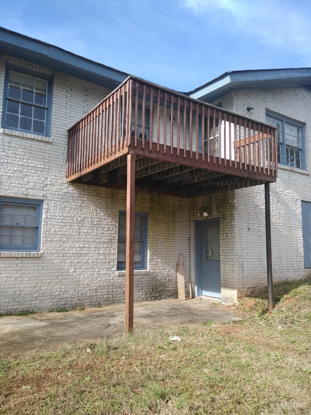 Back of house showing deck