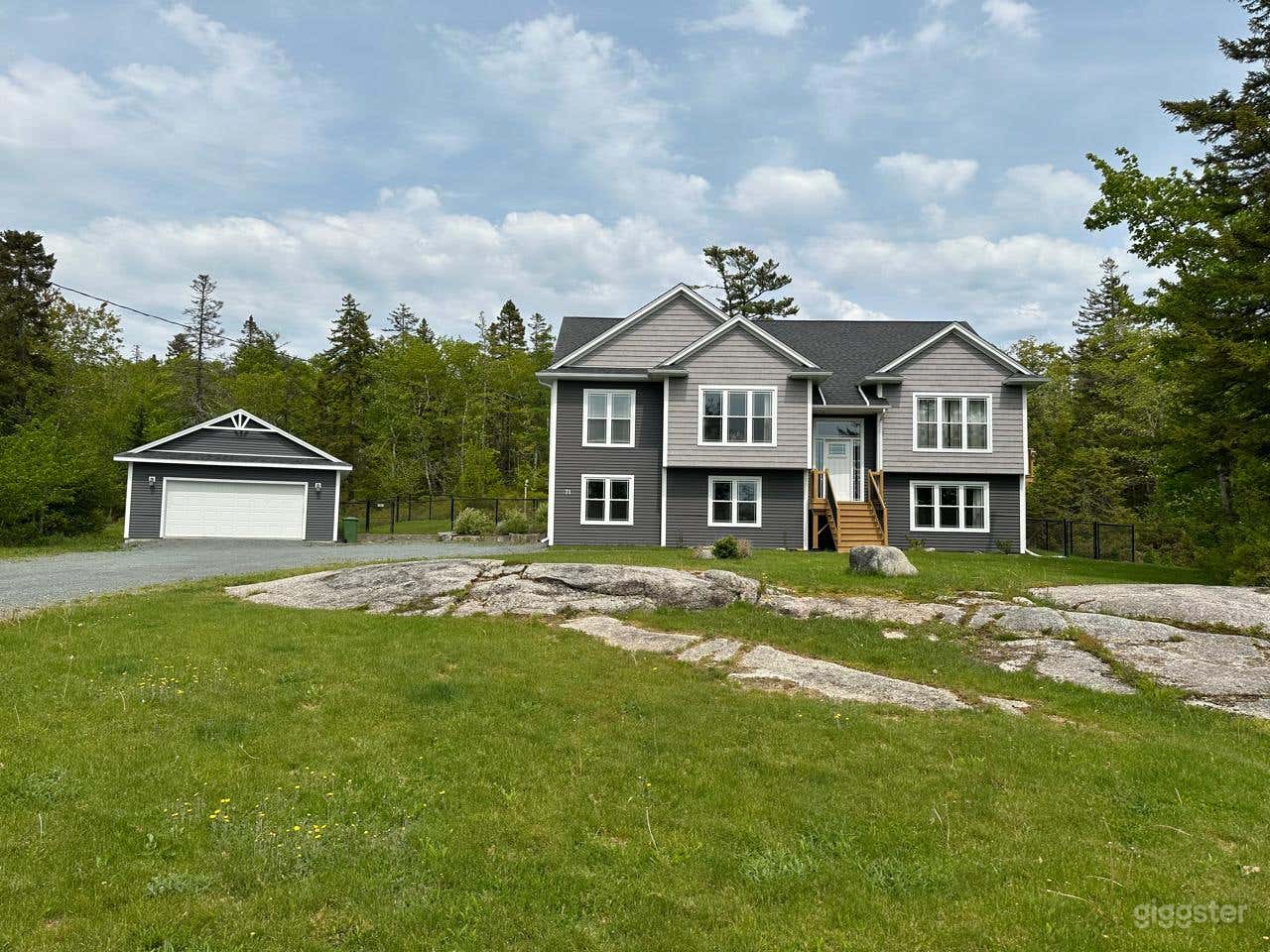 Peaceful Modern Home with Natural Backdrop Photo 1