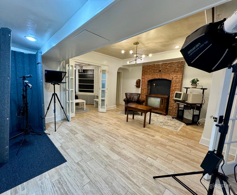  Secondary room with vintage props, smaller fireplace setting, recording area, and more. 