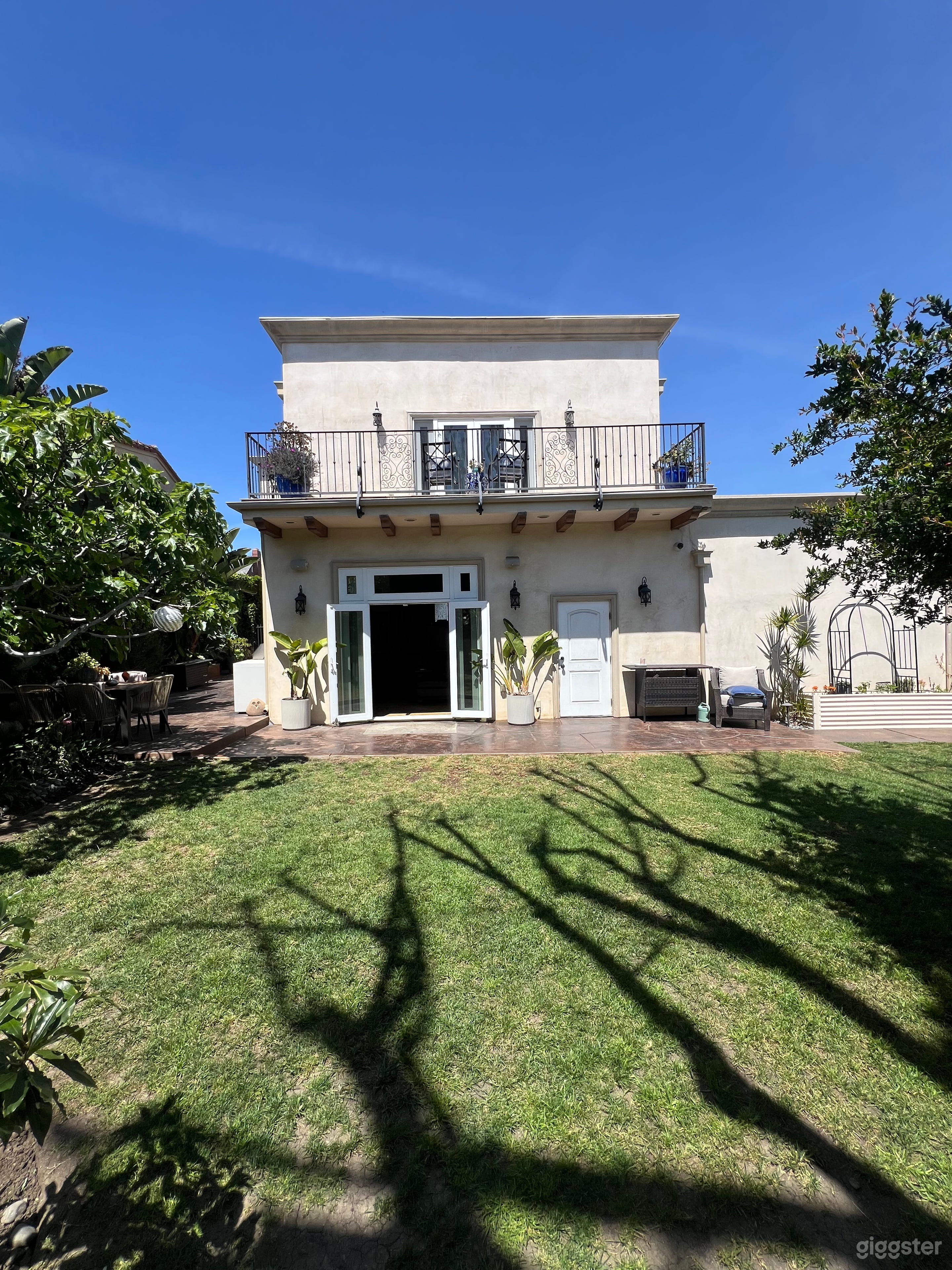 Private Garden Oasis with Waterfall in View Park Photo 3