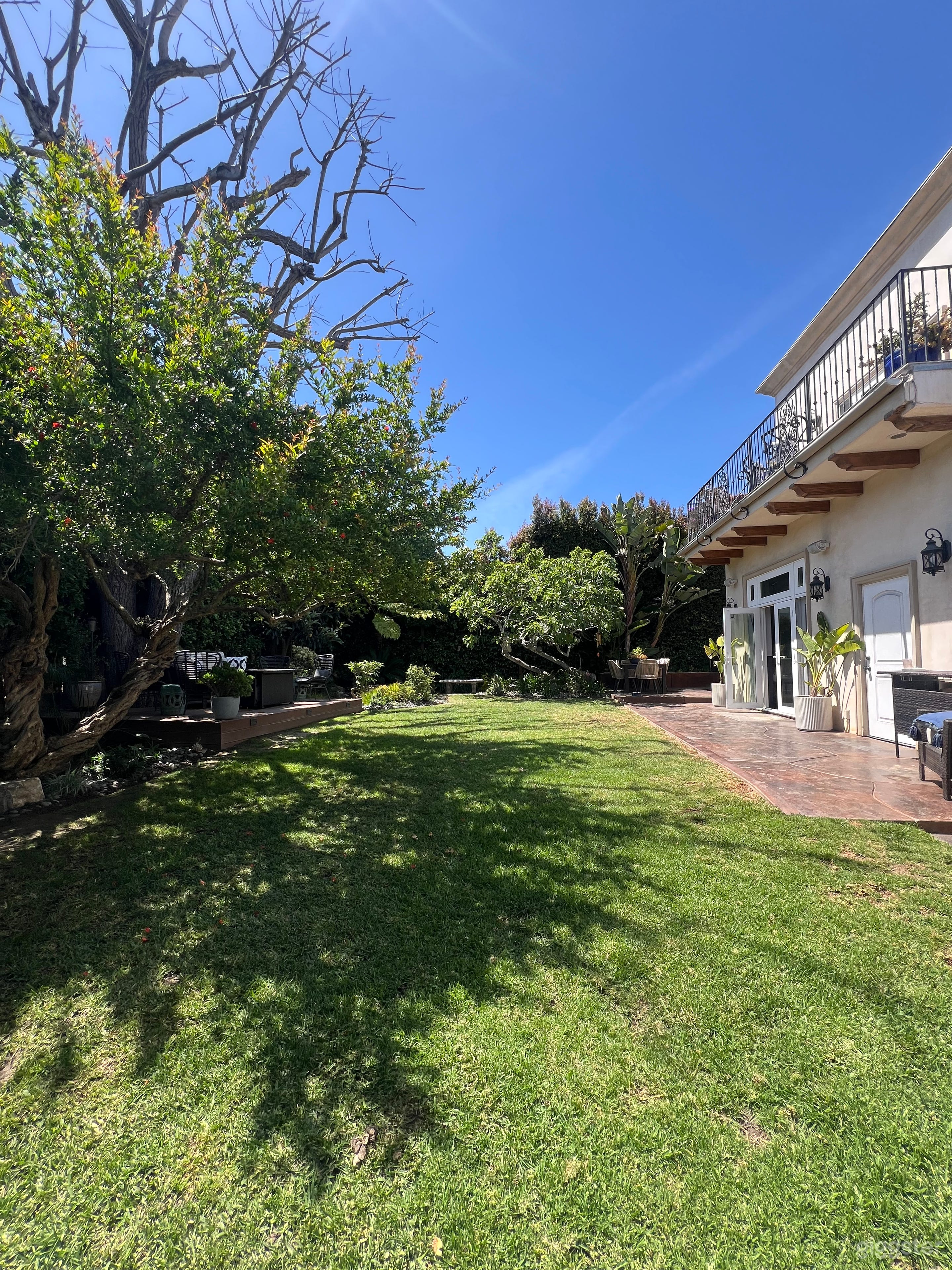 Private Garden Oasis with Waterfall in View Park Photo 1