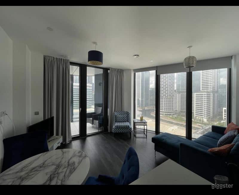 Gorgeous open plan room with floor to ceiling windows and balcony access