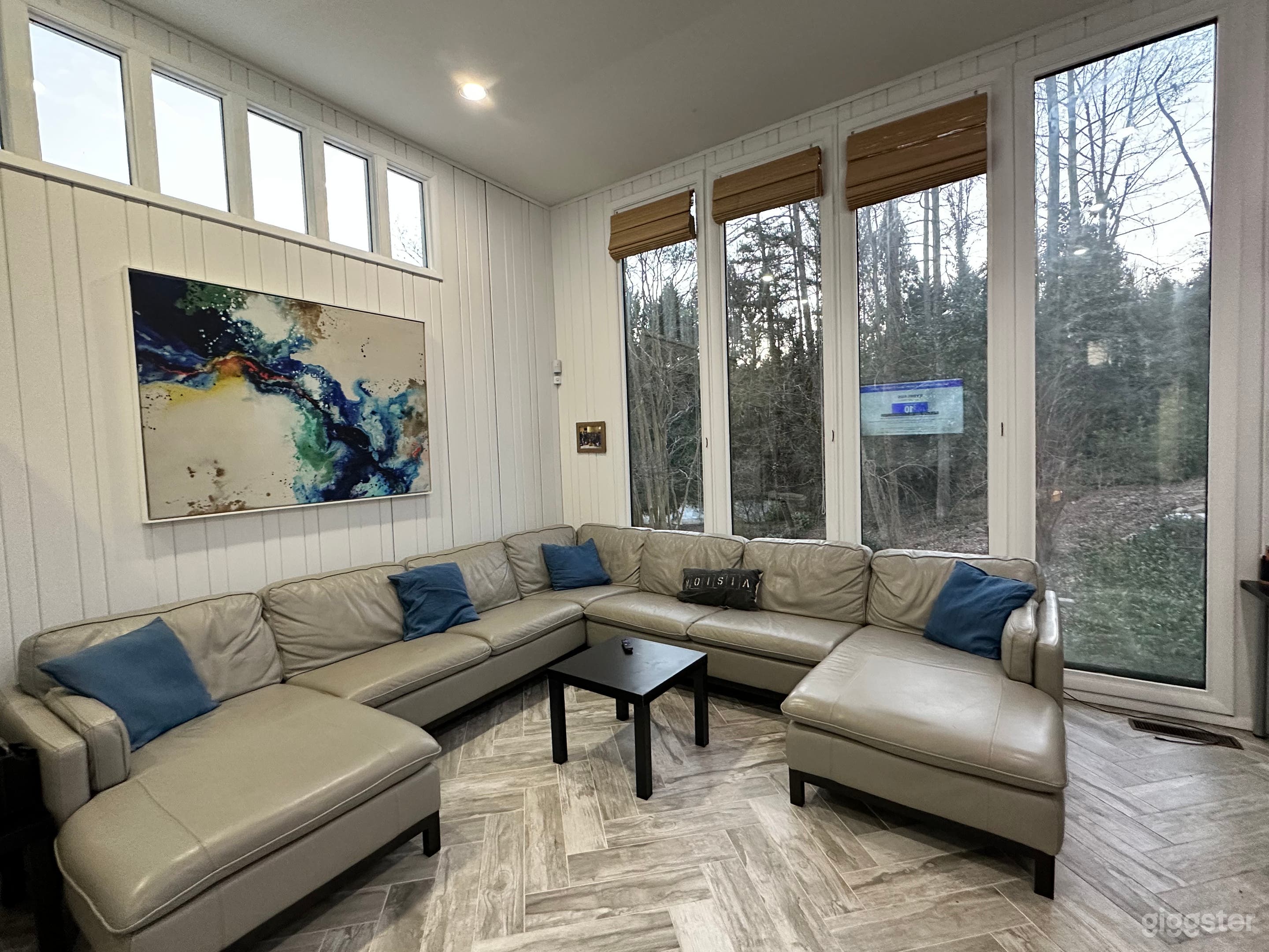 Family room with floor to ceiling windows 