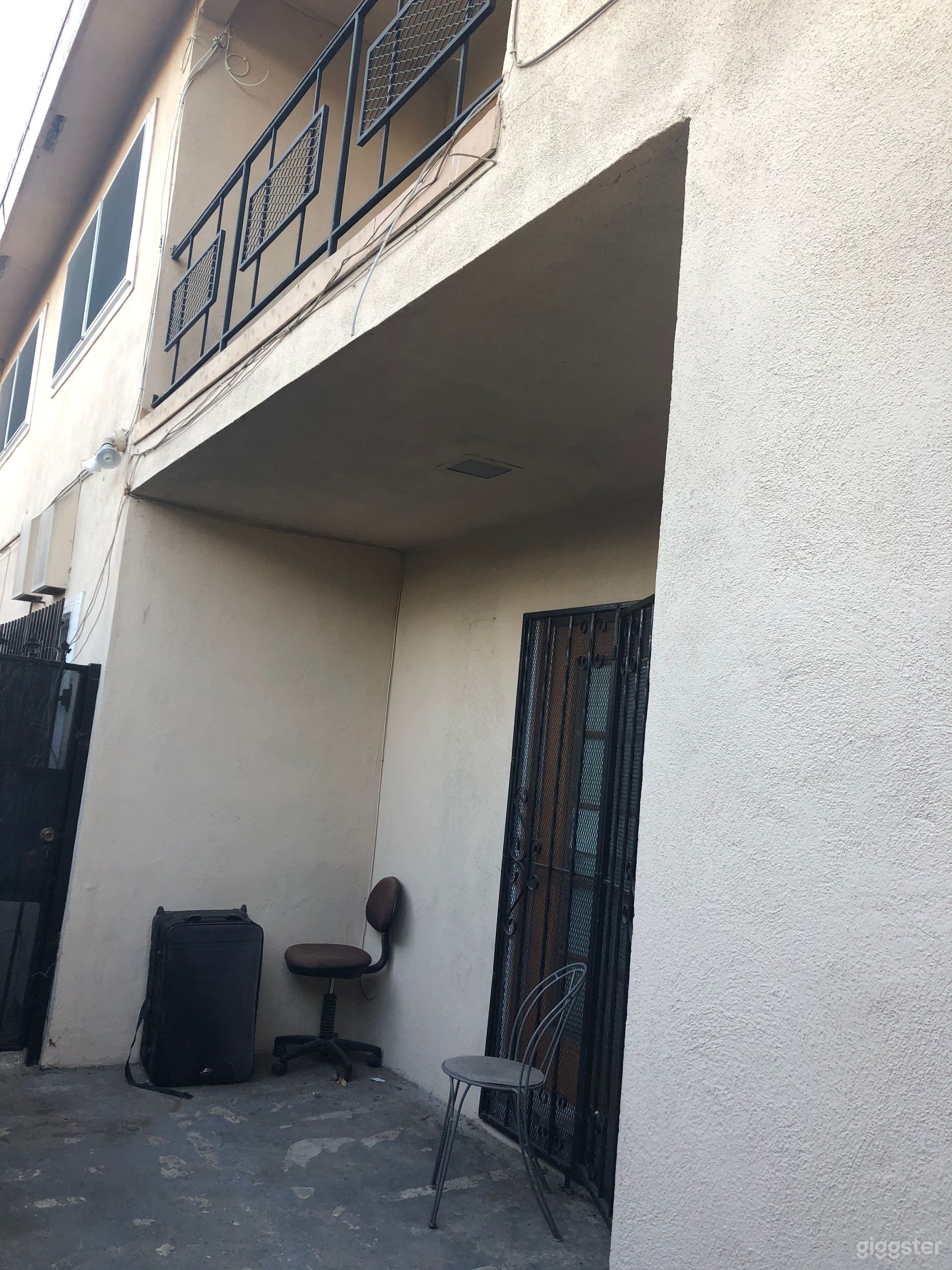 Outside balcony upstairs and patio downstairs 