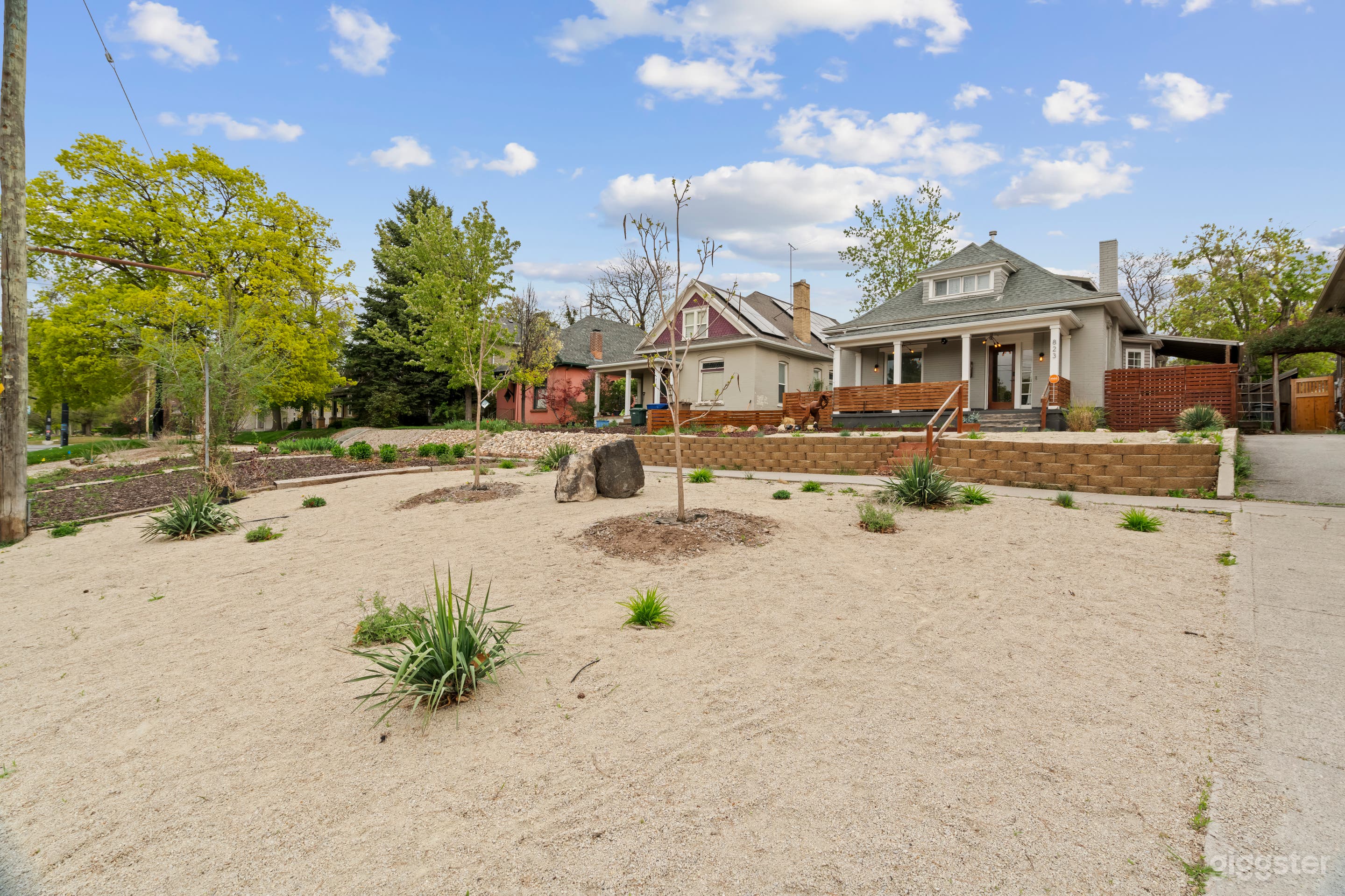 The home’s wide porch, natural textures, and timeless architecture provide a versatile backdrop for everything from nostalgic family scenes to modern lifestyle content. 