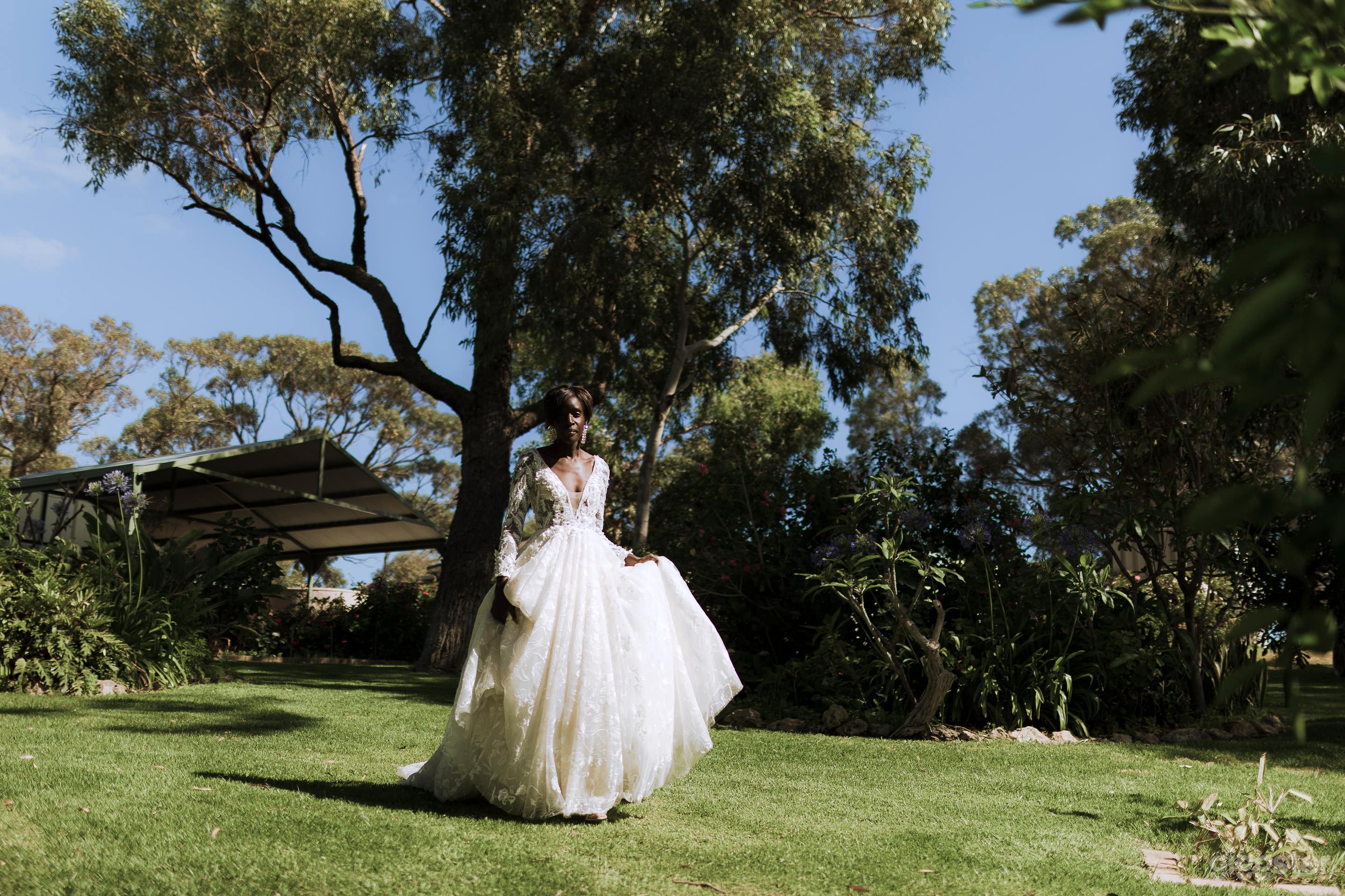 flower farm of roses and cut flowers with lake view bridal photo shoot model