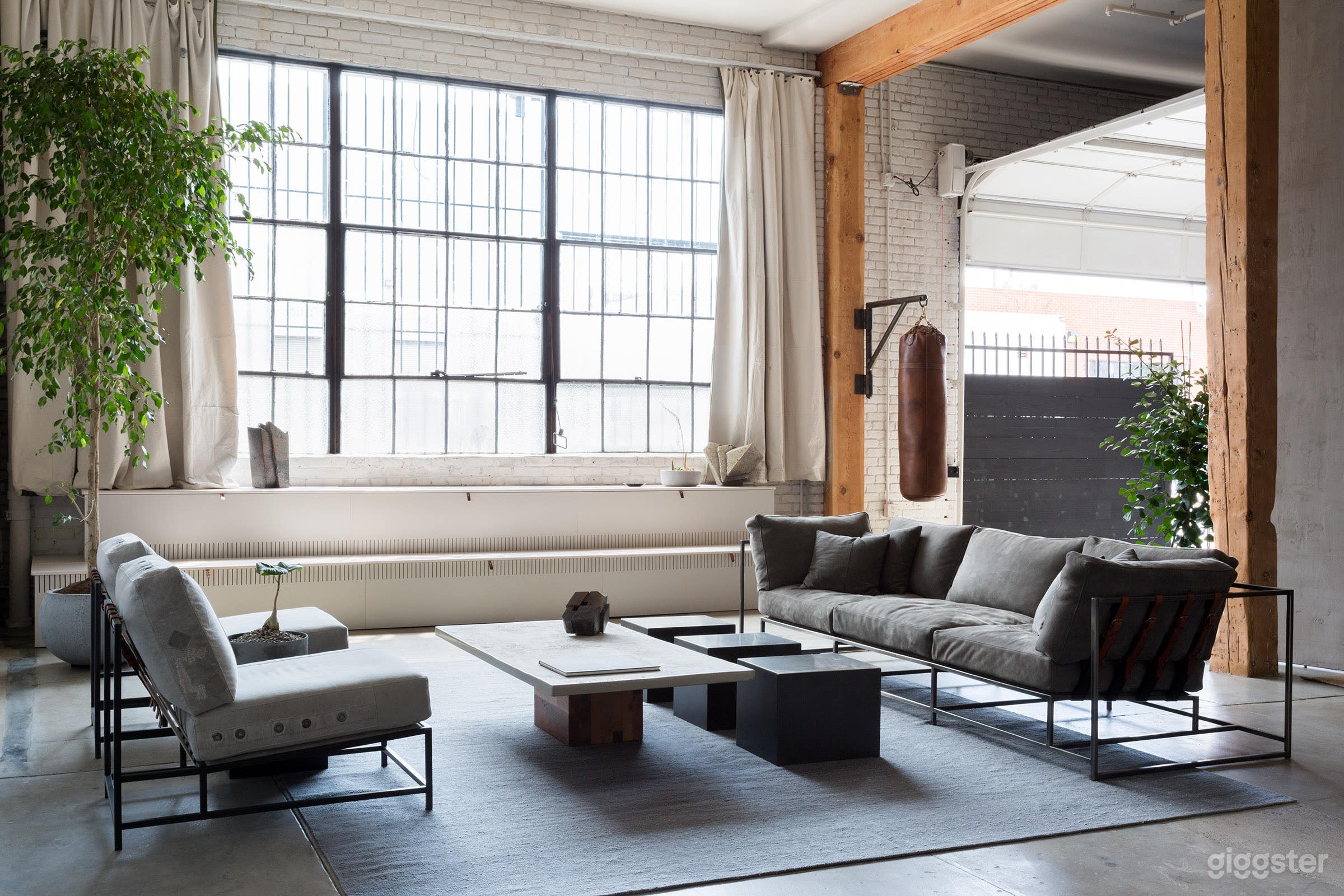 The massive factory windows let in natural light all day