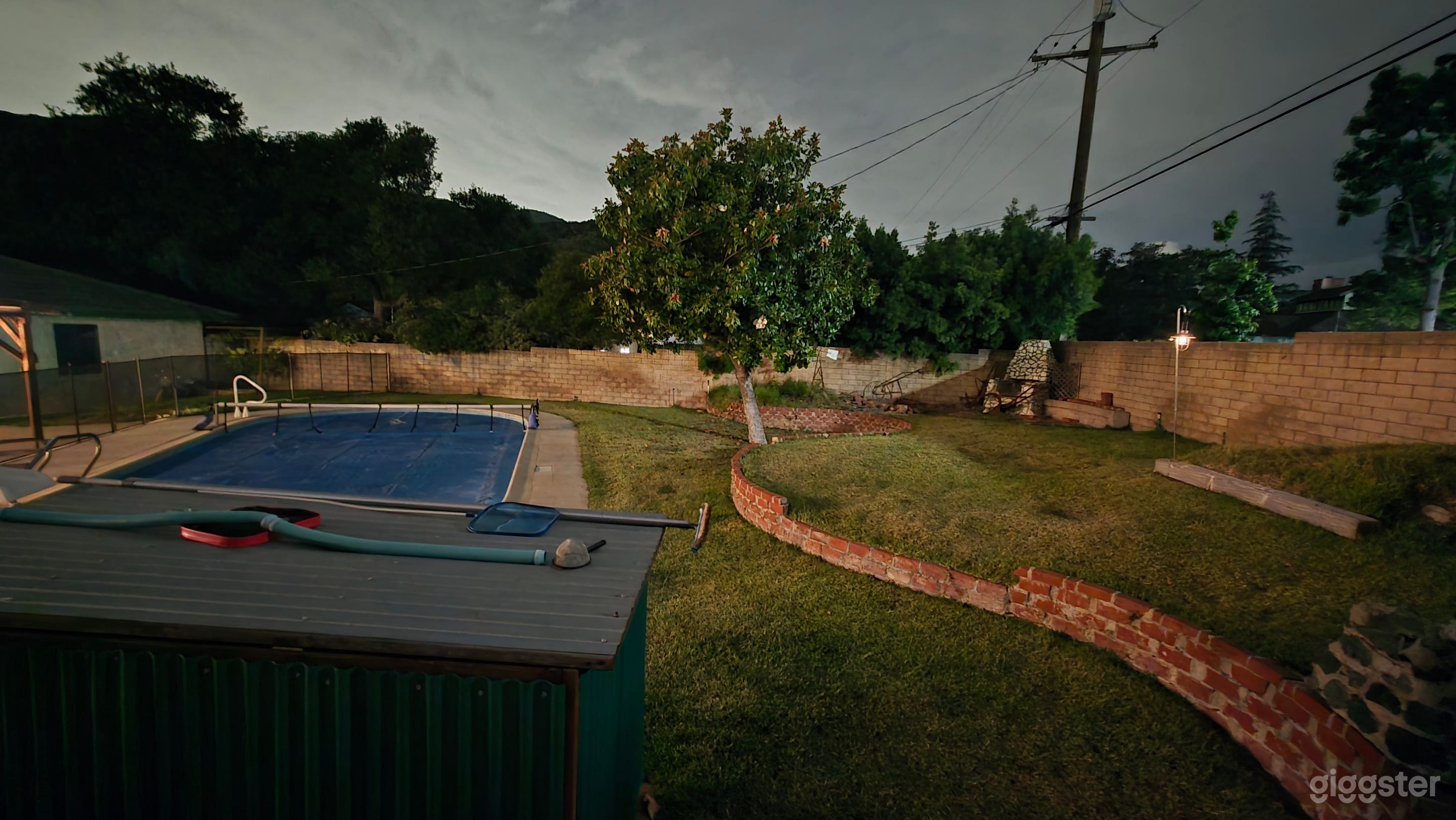 Backyard with jacuzzi, pool, and pool slide. Photo 3