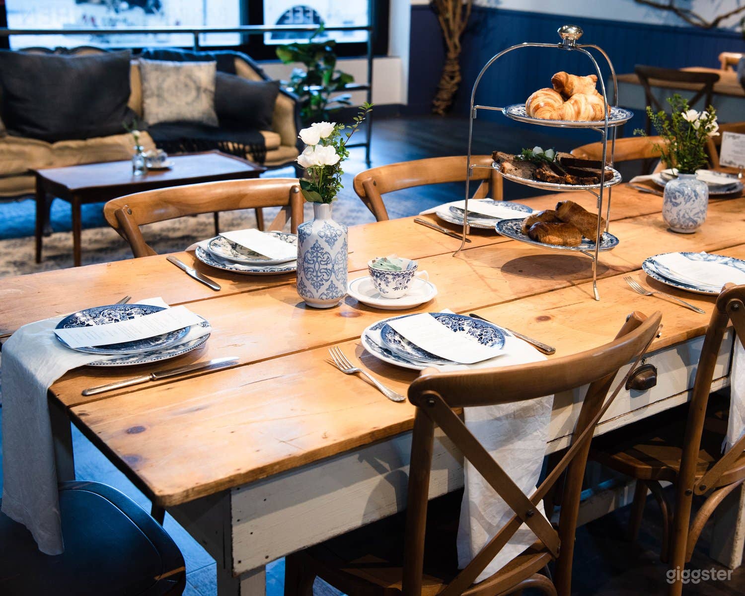 Blue and white china, custom printed menus and charming tabletop decor included