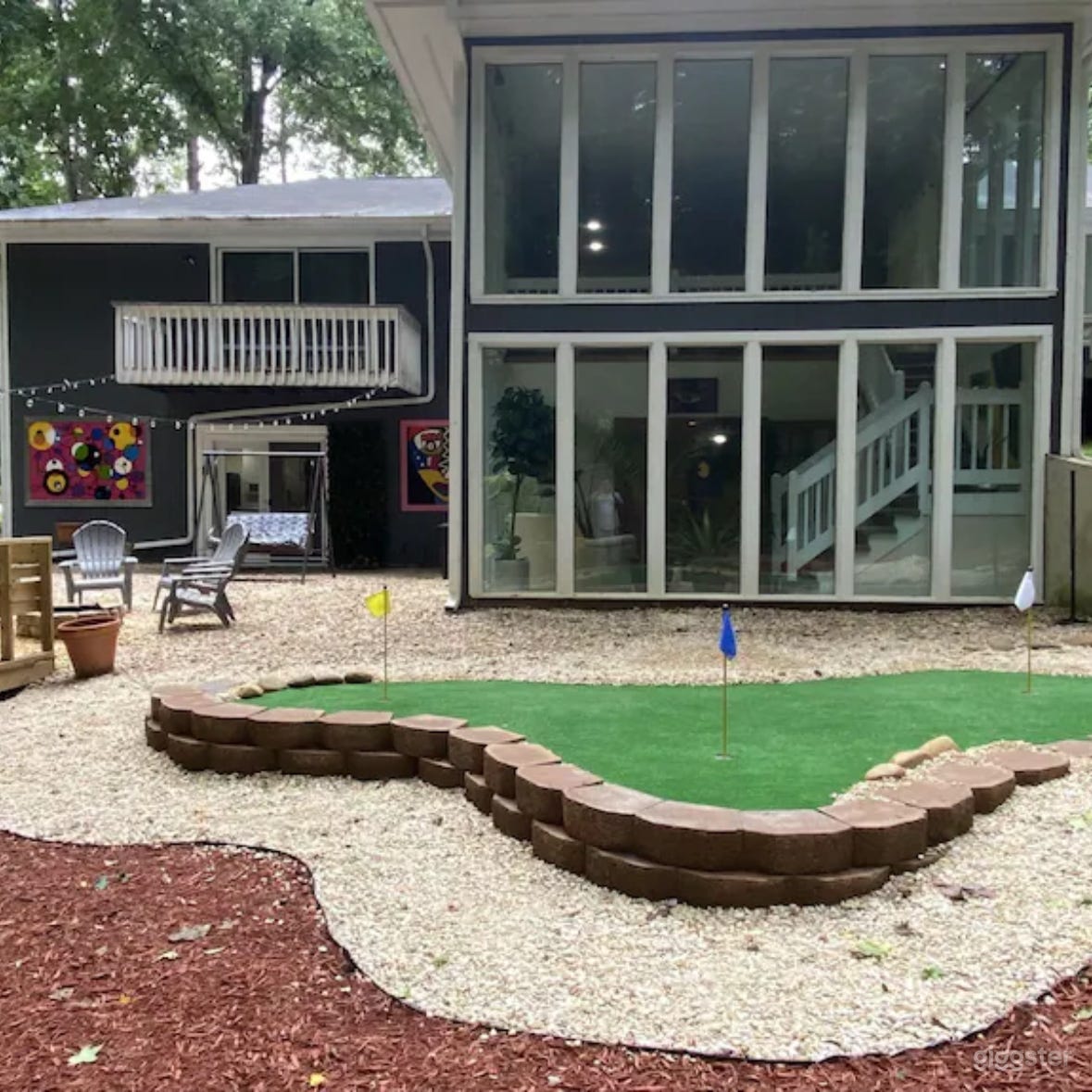 Beautiful Artistic glasshouse on wooded lot Photo 1