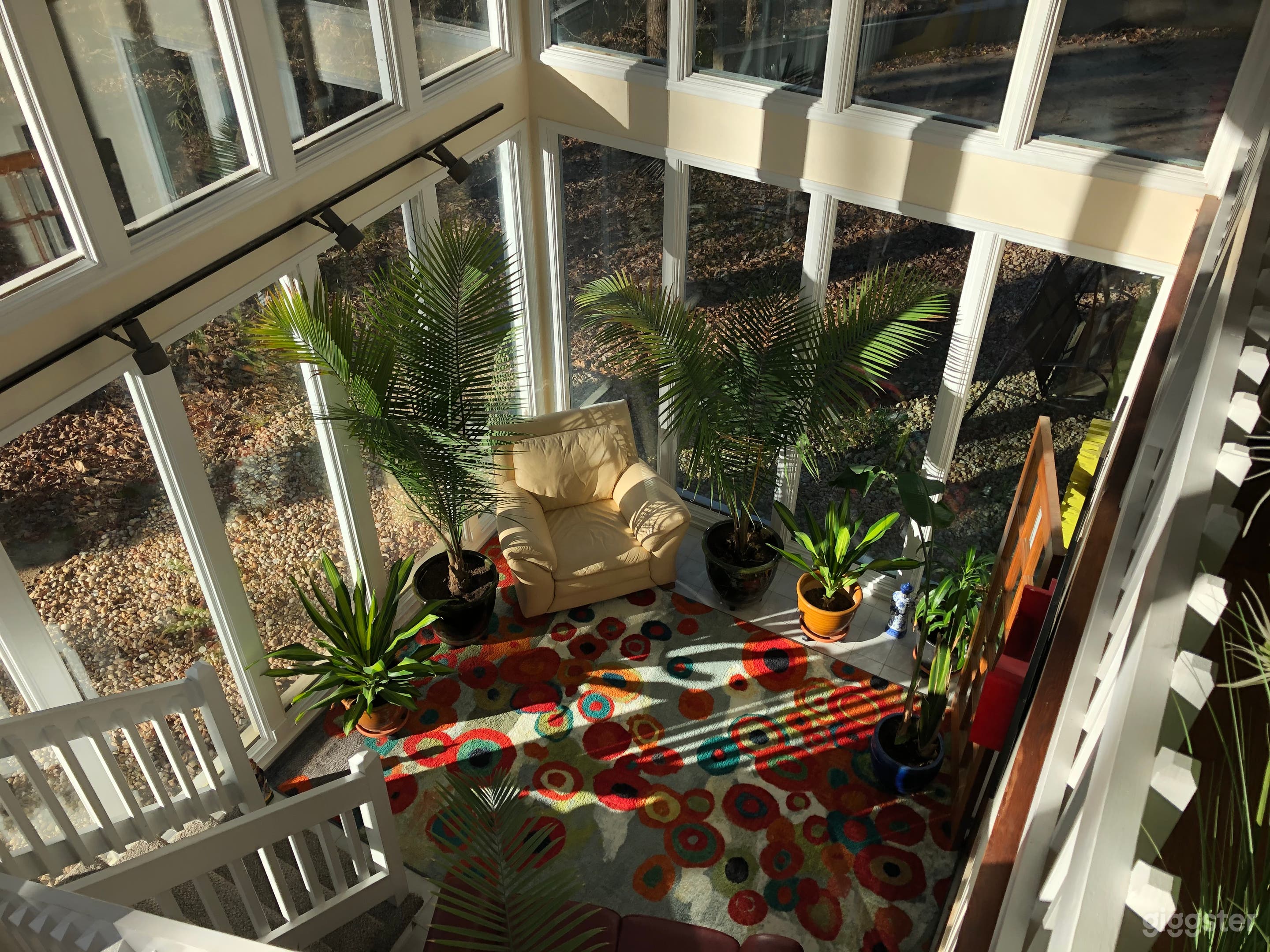 Looking down into two story sunroom