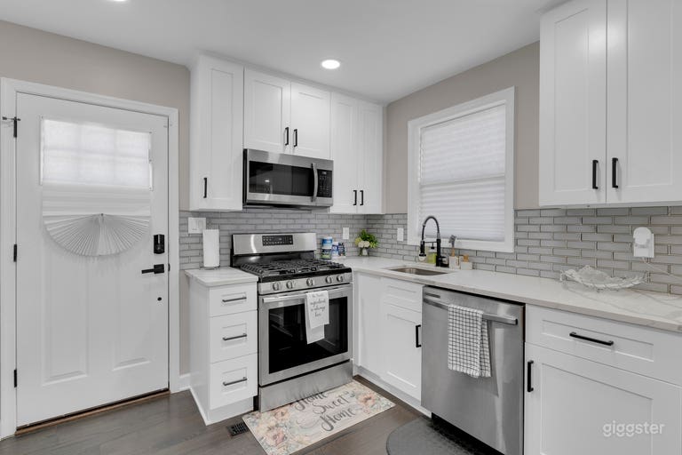  White kitchen with stainless steel appliances  
