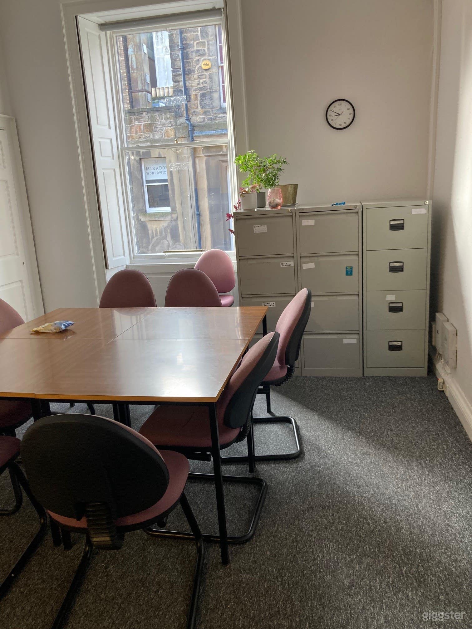 Spacious room with natural light. Tables may be rearranged.