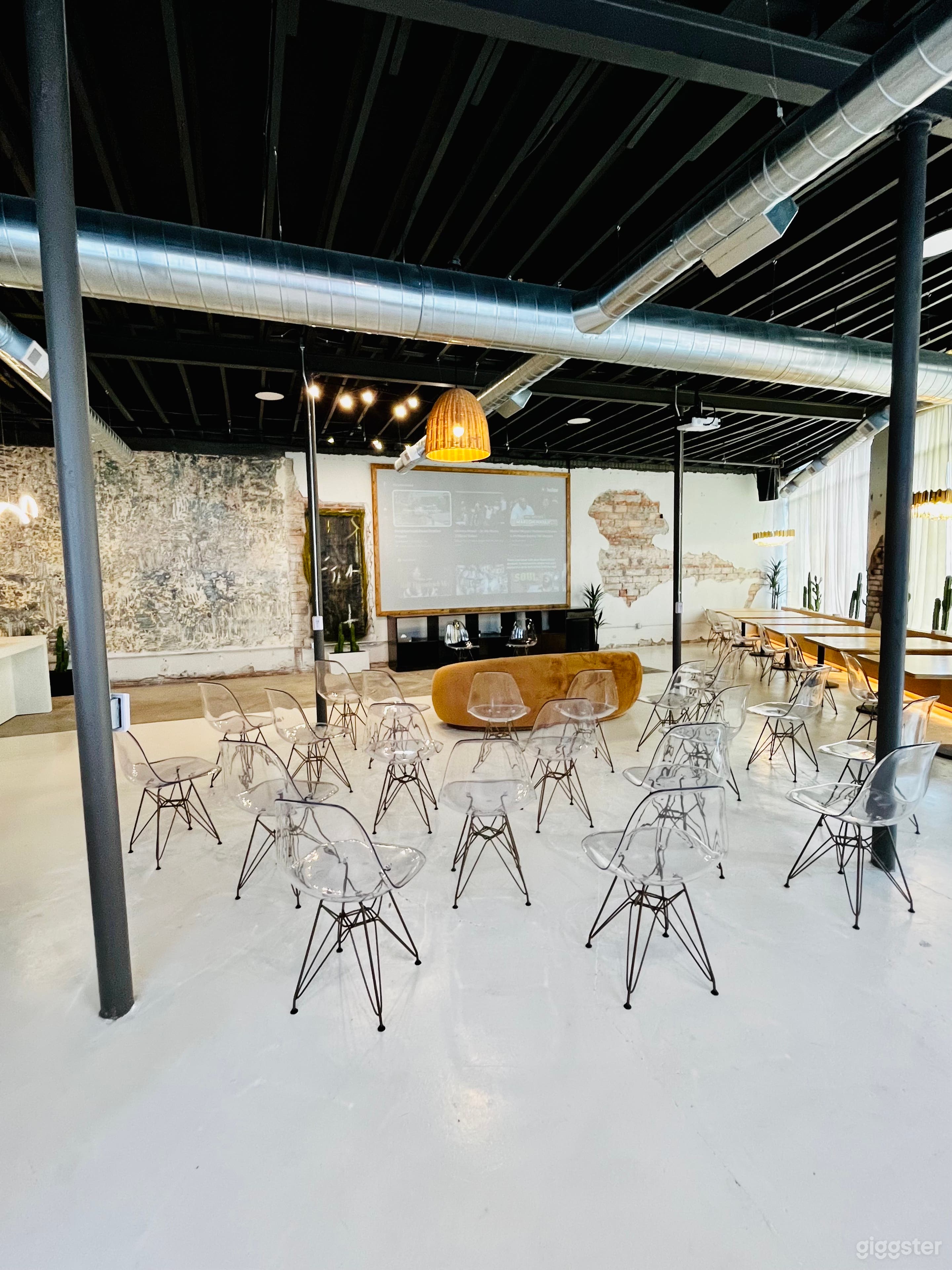 Front of Space with Projector Screen View (30 clear chairs)