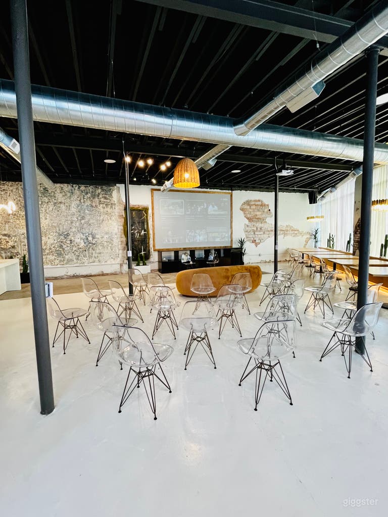  Front of Space with Projector Screen View (30 clear chairs) 