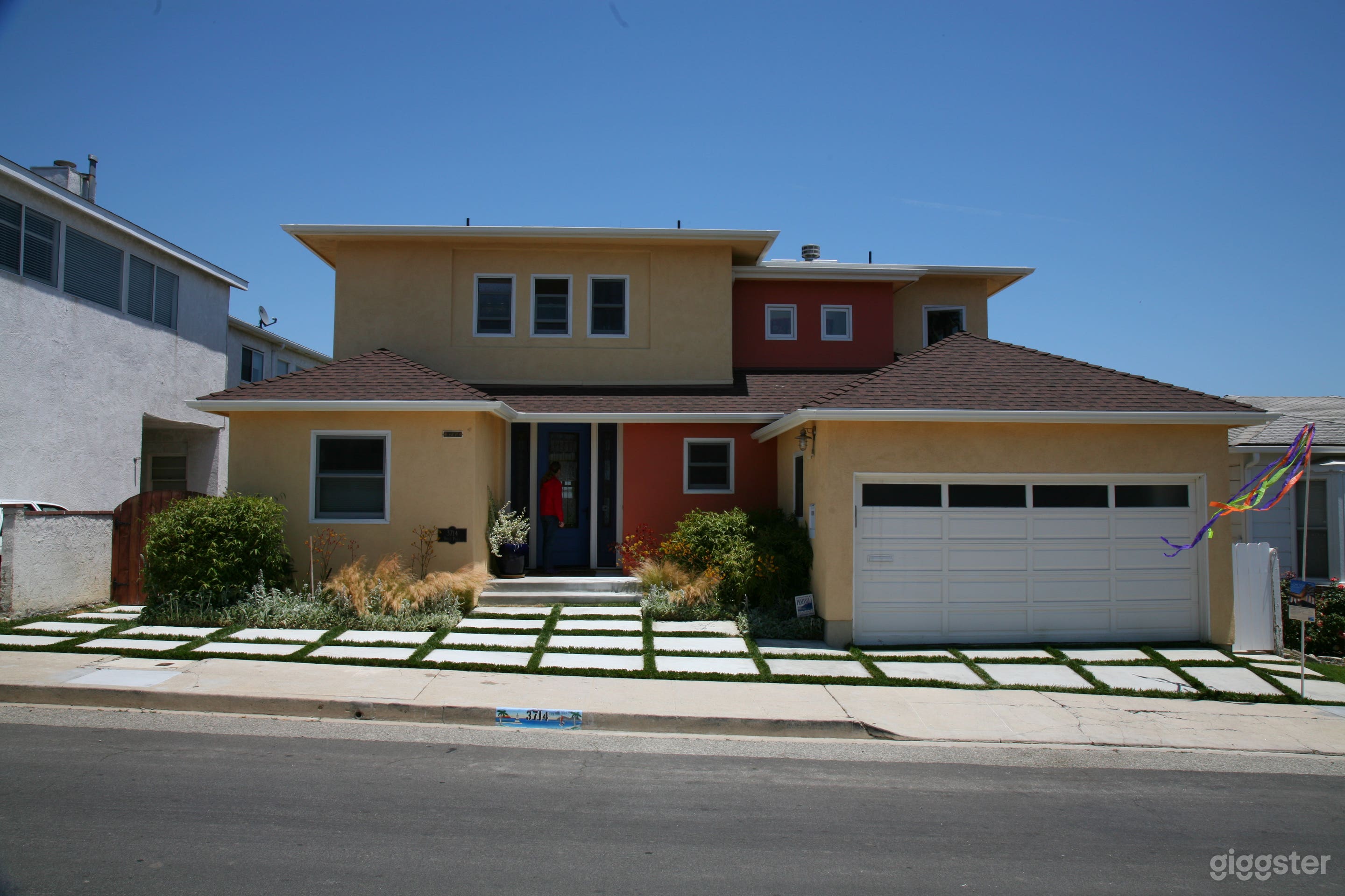 Street side: park large trailer on the pavers + garage access