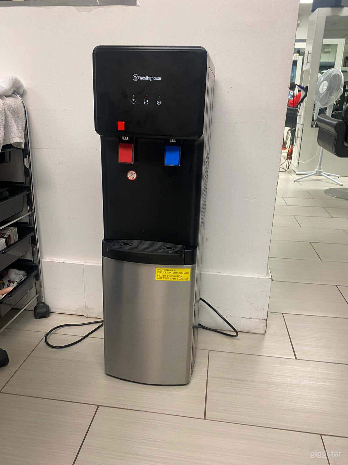 Water dispenser located upstairs. Can be used by film crew, just bring own water jug.