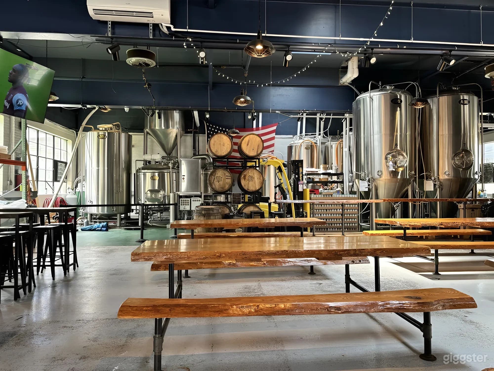 Spacious Industrial Taproom with 20-Foot Ceilings &amp; Brewery Tanks Photo 1