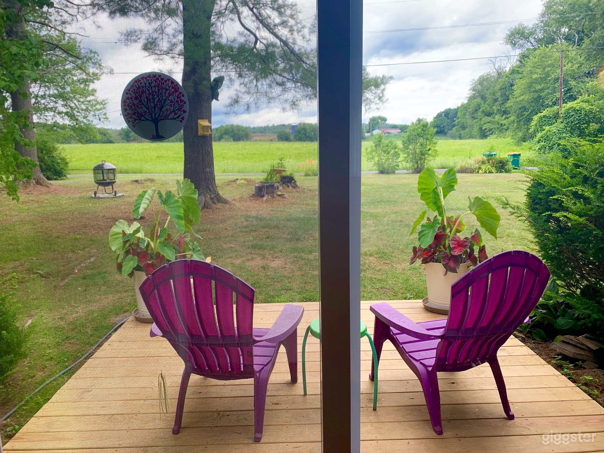 Views through sliding doors in kitchen towards bison farm