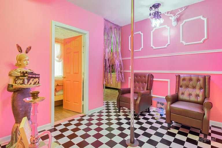  Graffiti lounge room. Common area during split booking. Features colored led Wi-Fi lighting . 