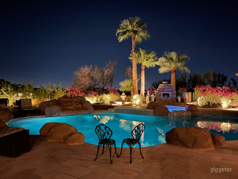  Huge pool with luscious grounds. 
