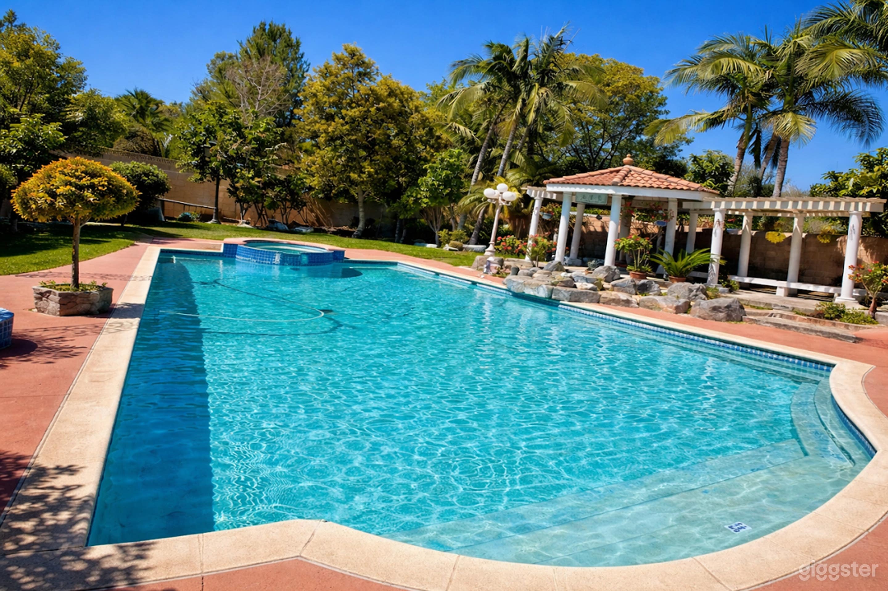 Private Tropical Pool Backyard with Gazebo & Palm Trees Photo 2