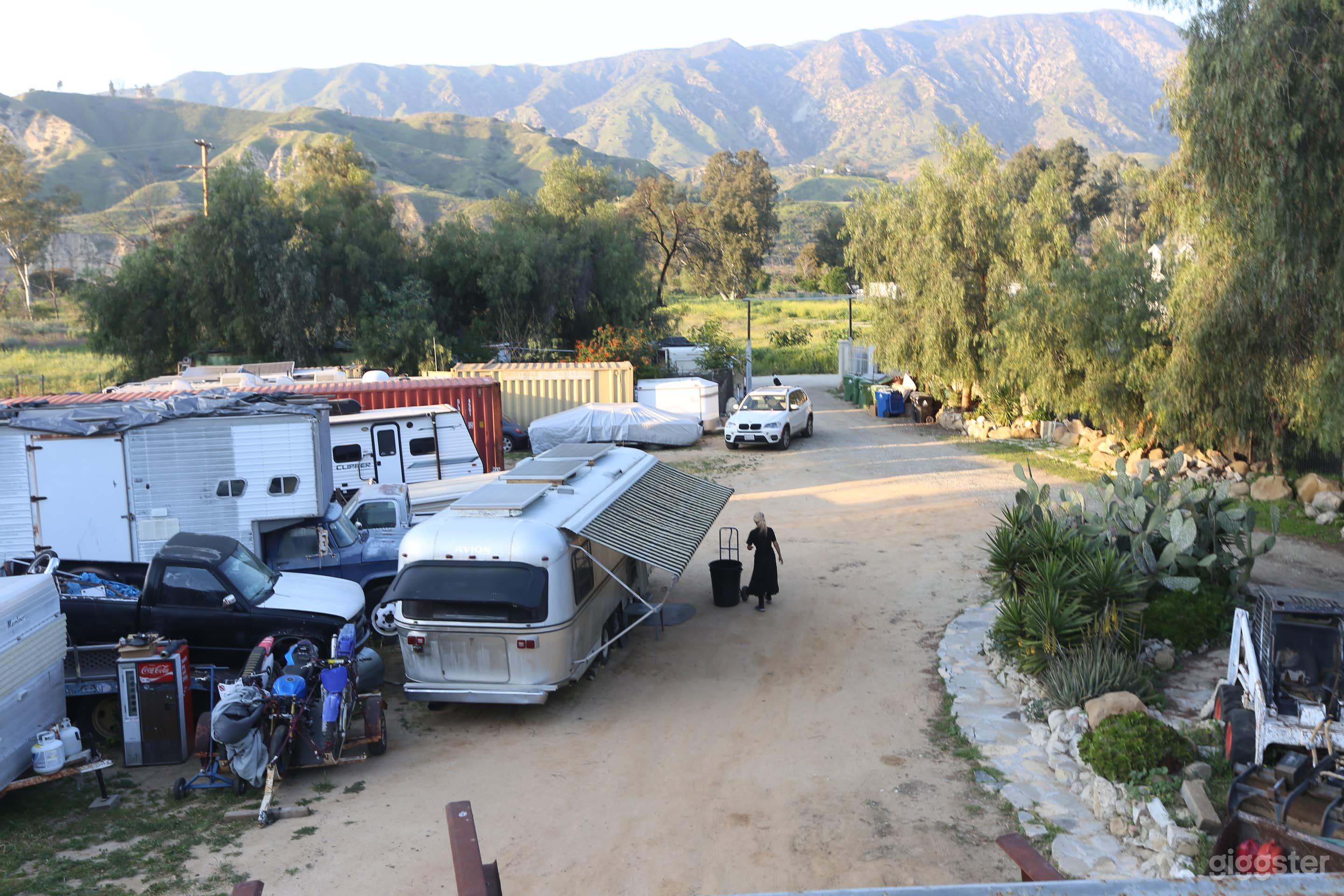 RV STORAGE YARD, MOVIE CAR REPAIR PARKING LOT Photo 1