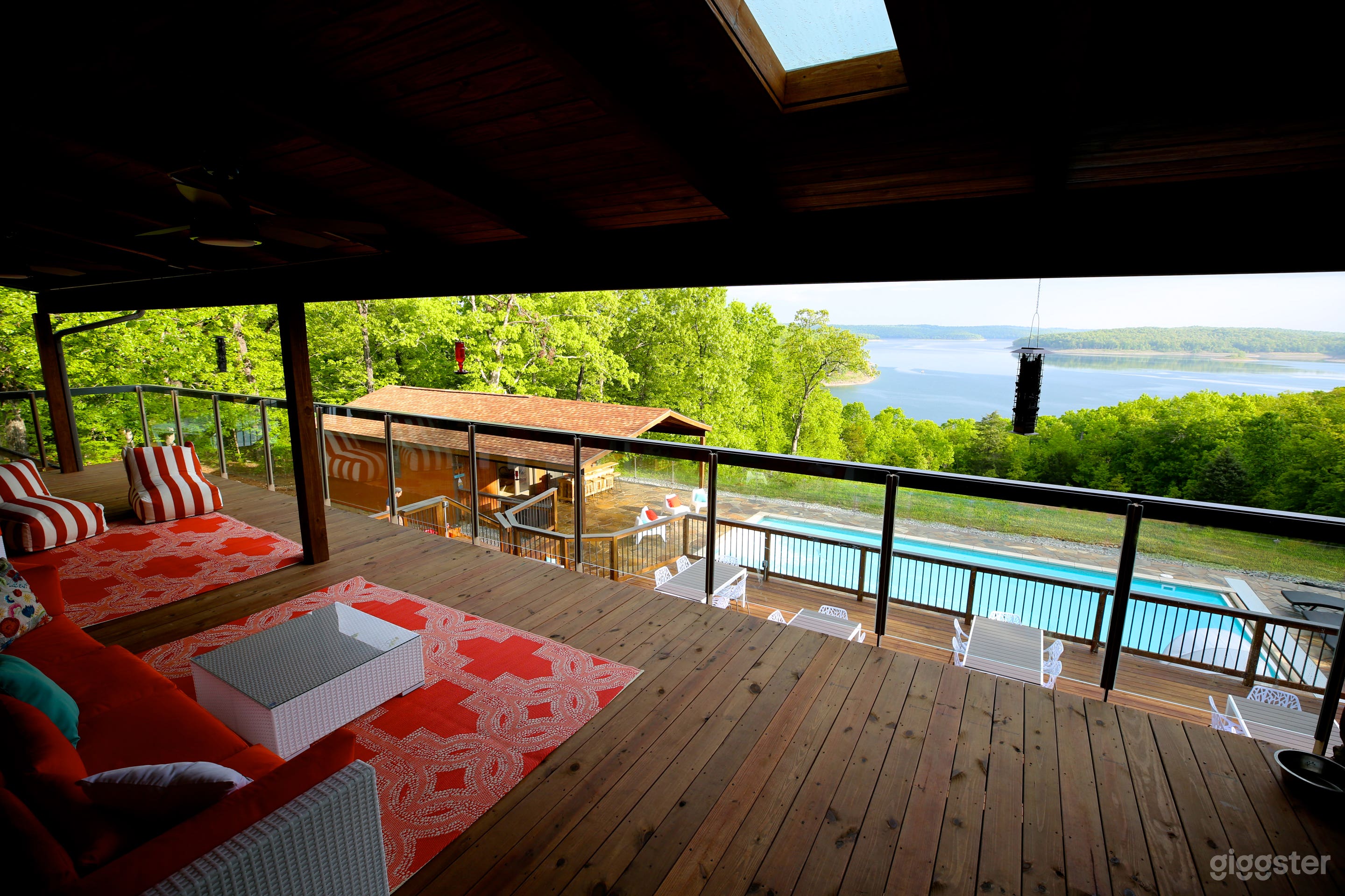 Top deck with views over pool and lake.