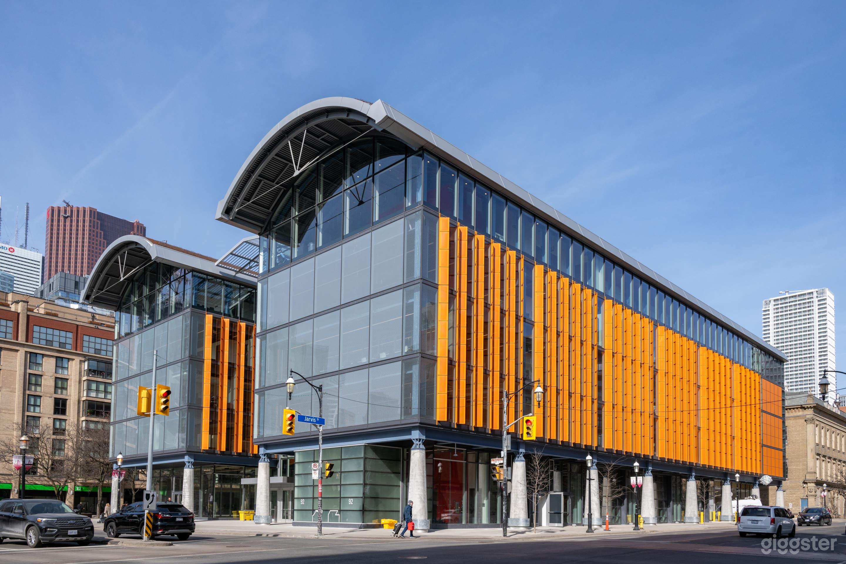 Modern Glass Market Hall with Park Access Photo 1